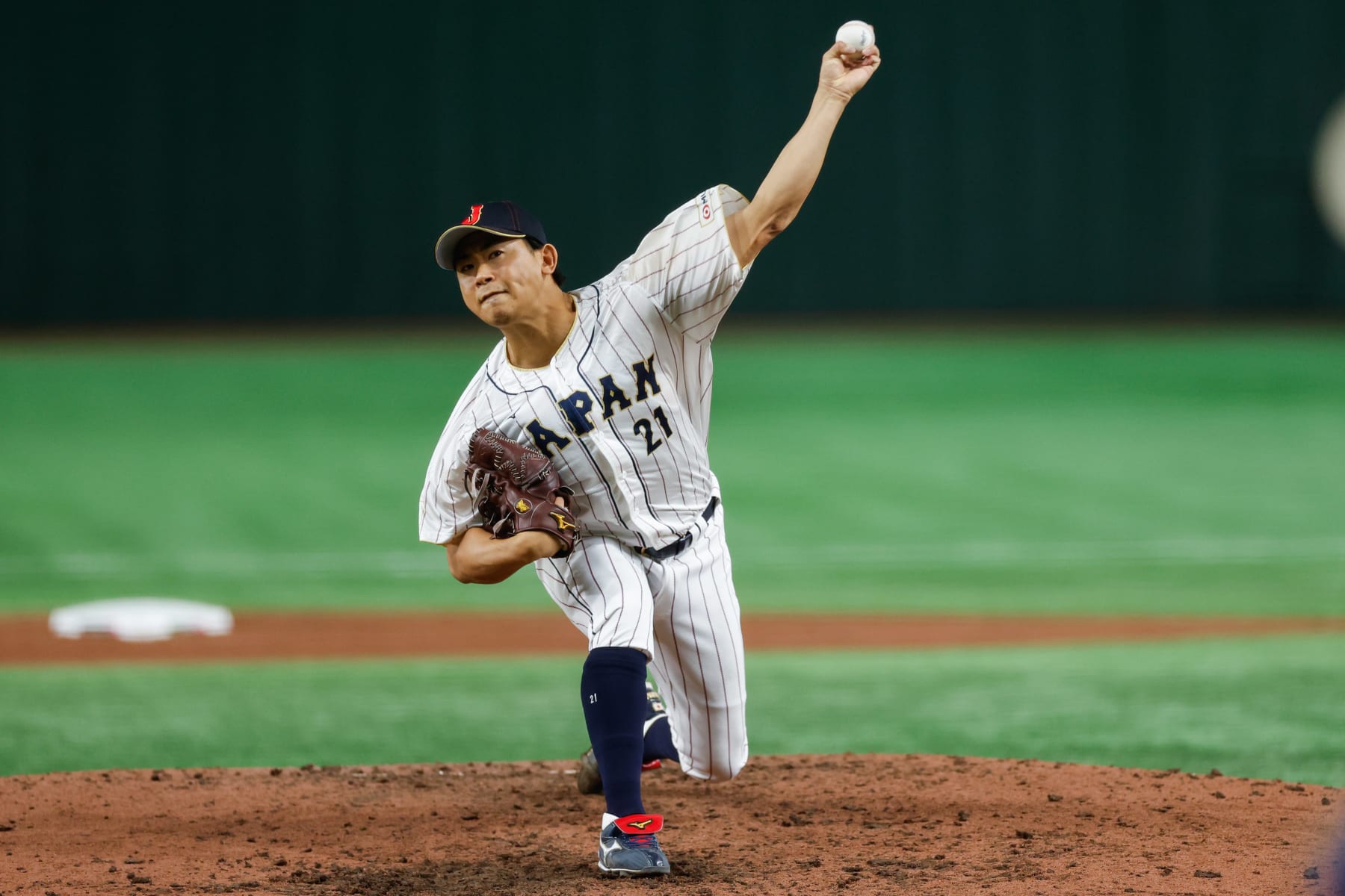 BUNKYO CITY, JAPAN - MARCH 16:  Shota Imanaga #21 of Team Japan pitches in the sixth inning during the 2023 World Baseball Classic Quarterfinal game between Team Italy and Team Japan at Tokyo Dome on Thursday, March 16, 2023 in Tokyo, Japan. (Photo by Yuki Taguchi/WBCI/MLB Photos via Getty Images)
