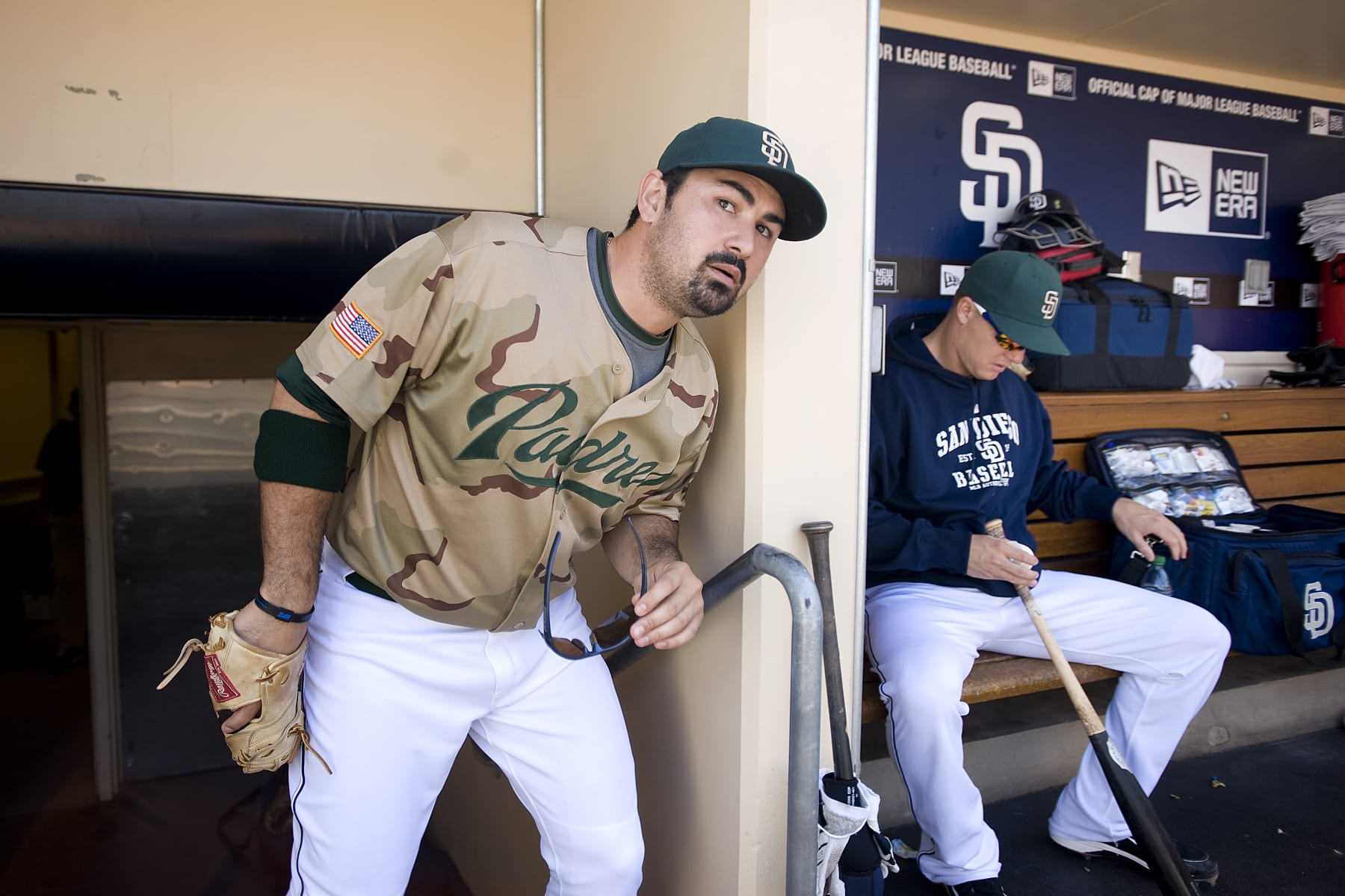 SAN DIEGO - SEPTEMBER 12:  Adrian Gonzalez #23 of the San Diego Padres looks out of the dugout prior to the game against the San Francisco Giants at Petco Park on September 12, 2010 in San Diego, California. The Giants won 6-1. (Photo by Andy Hayt/Getty Images)