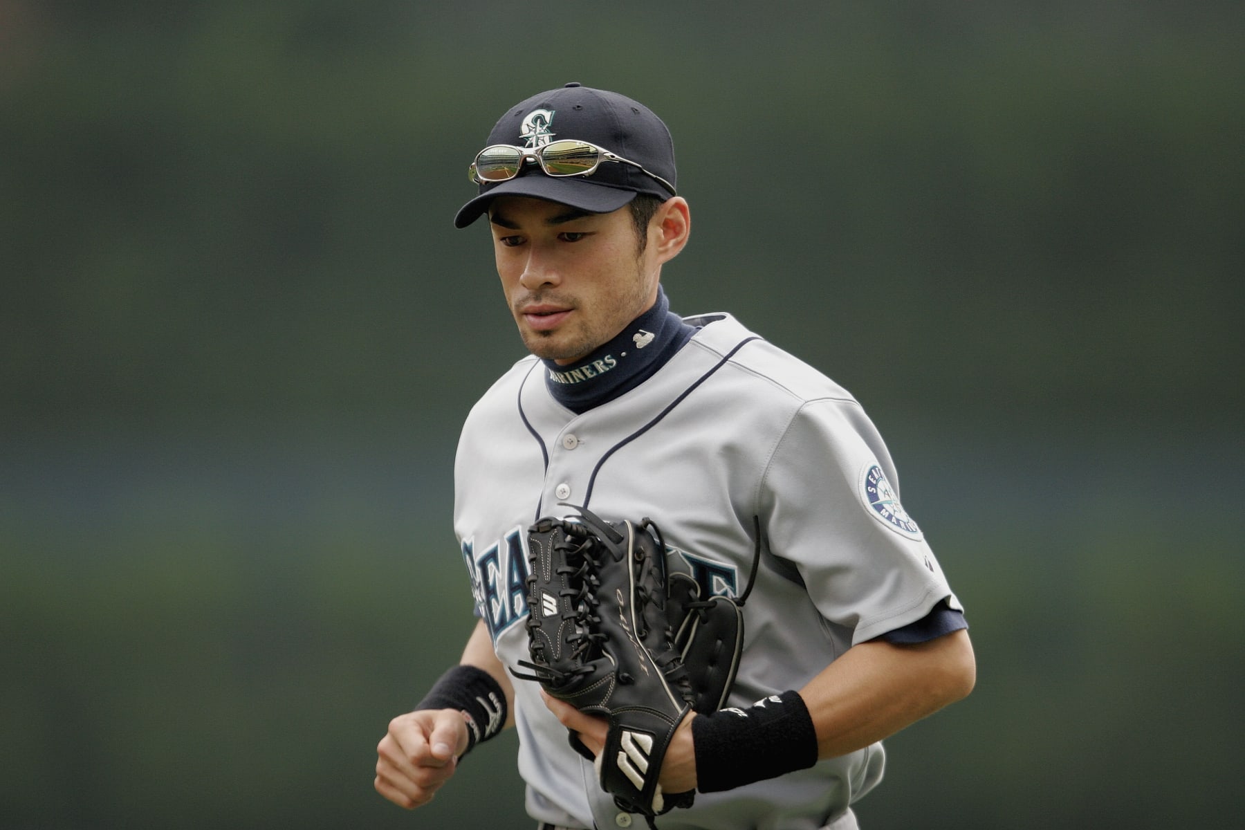 DETROIT - SEPTEMBER 25:  Ichiro Suzuki #51 of the Seattle Mariners jogs off the field during the game against the Detroit Tigers at Comerica Park on September 25, 2005 in Detroit, Michigan. The Tigers defeated the Mariners 8-1. (Photo by Tom Pidgeon/Getty Images)