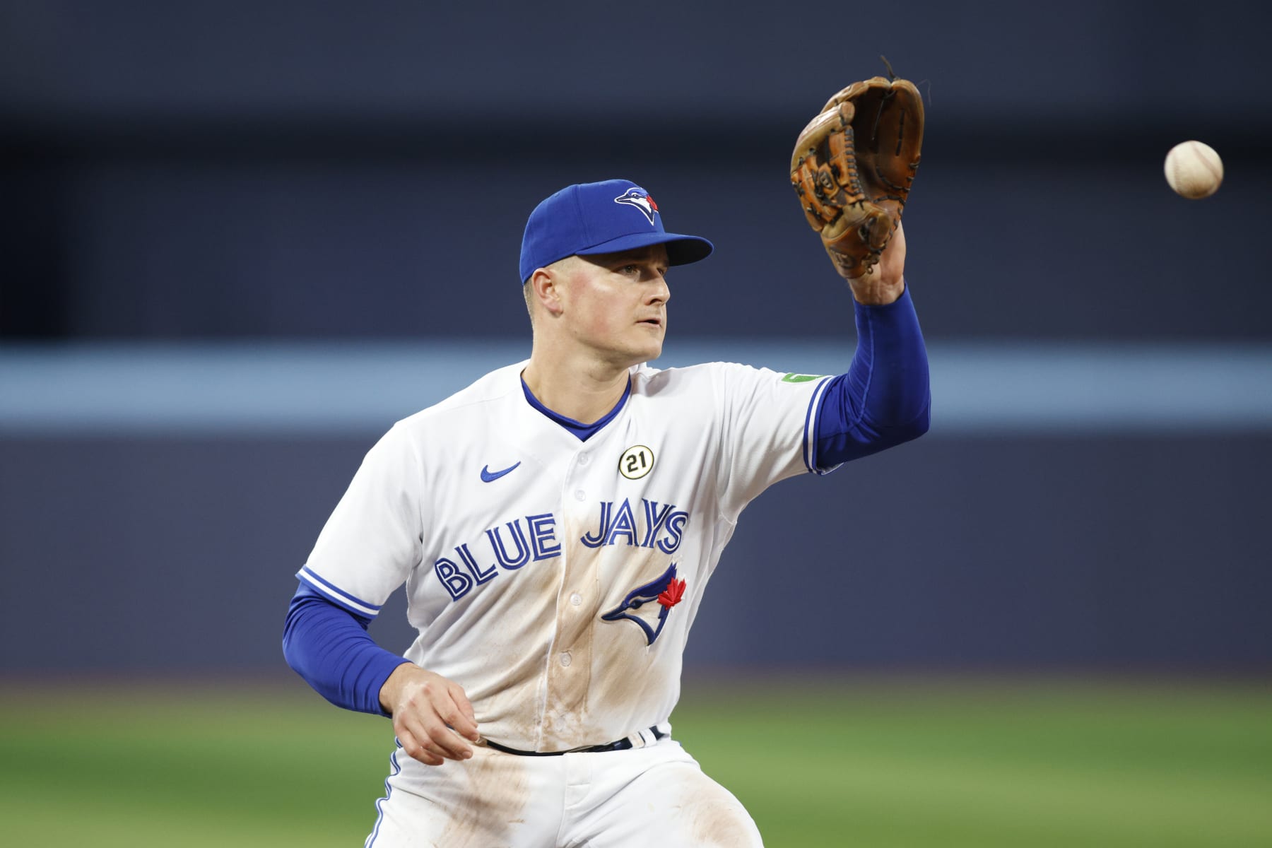 TORONTO, CANADA - SEPTEMBER 15: Matt Chapman #26 of the Toronto Blue Jays makes a play on a ball during their MLB game against the Boston Red Sox  at Rogers Centre on September 15, 2023 in Toronto, Canada. (Photo by Cole Burston/Getty Images)