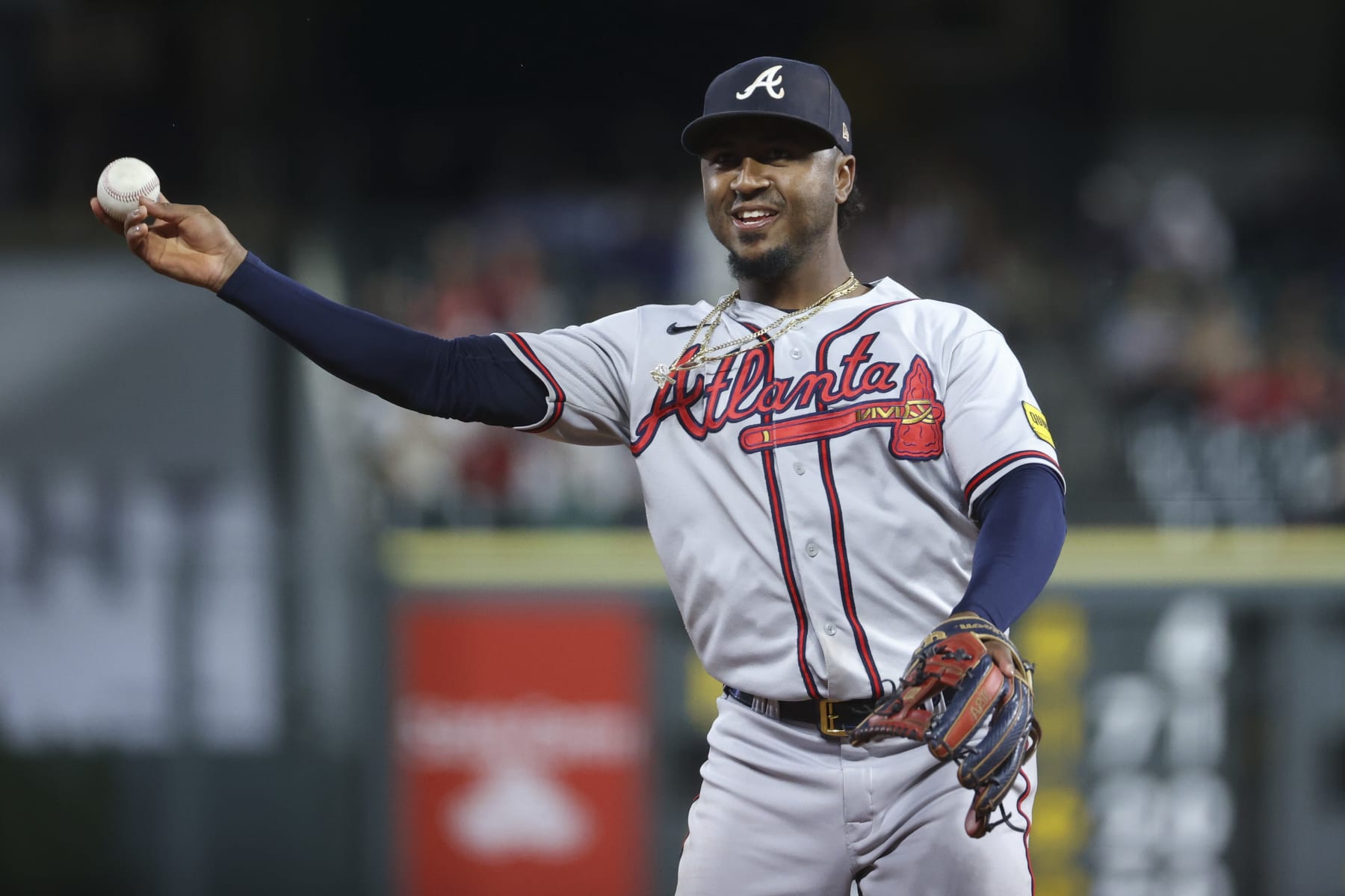 DENVER, COLORADO - AUGUST 28: Ozzie Albies #1 of the Atlanta Braves throws the ball in between innings against the Colorado Rockies at Coors Field on August 28, 2023 in Denver, Colorado. (Photo by Tyler Schank/Clarkson Creative/Getty Images)