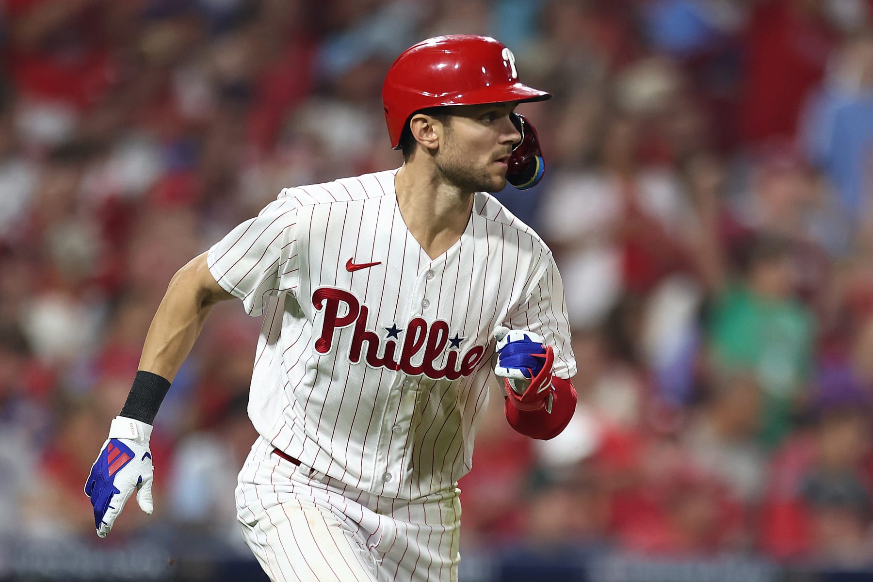 PHILADELPHIA, PENNSYLVANIA - OCTOBER 03: Trea Turner #7 of the Philadelphia Phillies runs after hitting a single during the fifth inning against the Miami Marlins in Game One of the Wild Card Series at Citizens Bank Park on October 03, 2023 in Philadelphia, Pennsylvania. (Photo by Tim Nwachukwu/Getty Images)