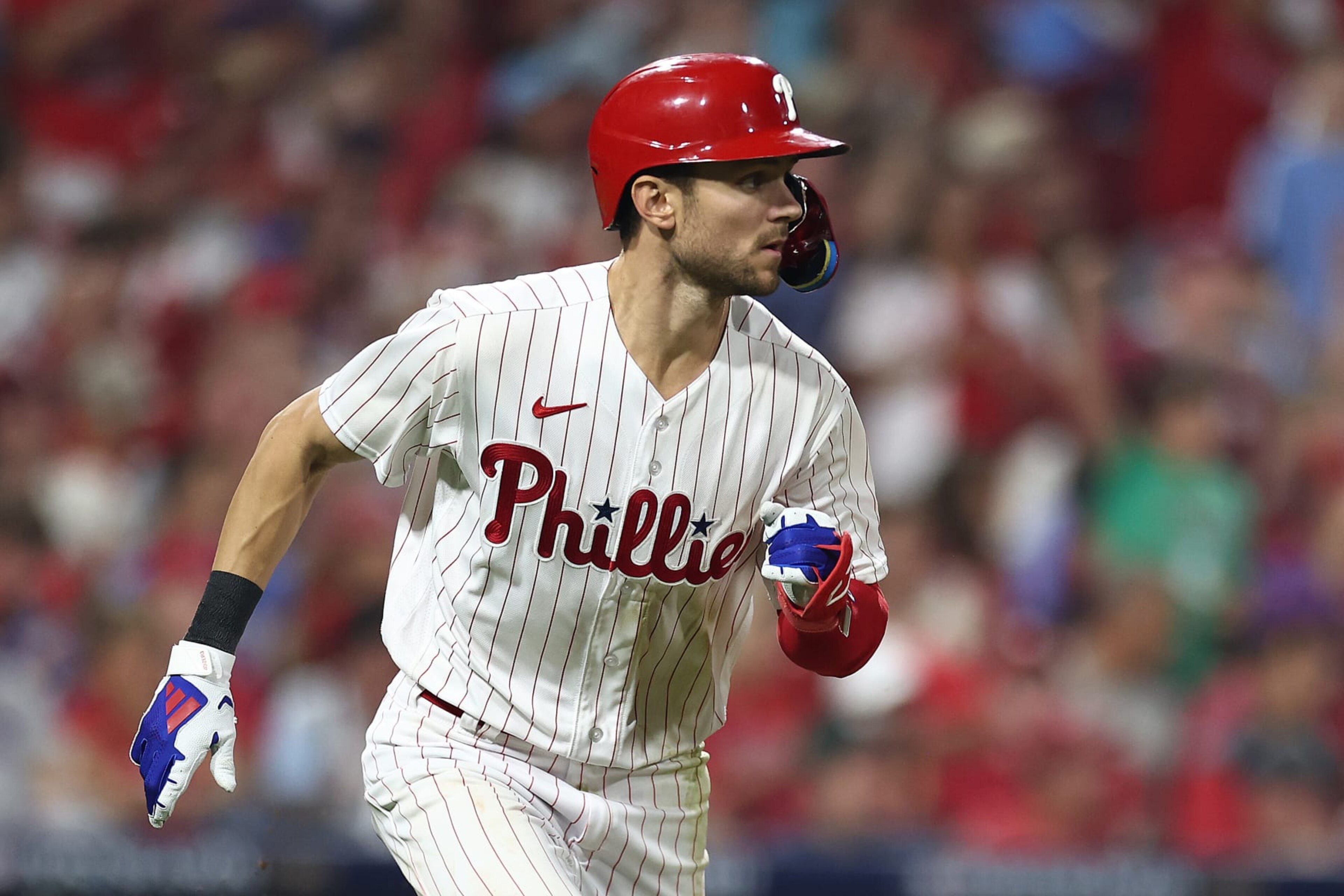 PHILADELPHIA, PENNSYLVANIA - OCTOBER 03: Trea Turner #7 of the Philadelphia Phillies runs after hitting a single during the fifth inning against the Miami Marlins in Game One of the Wild Card Series at Citizens Bank Park on October 03, 2023 in Philadelphia, Pennsylvania. (Photo by Tim Nwachukwu/Getty Images)