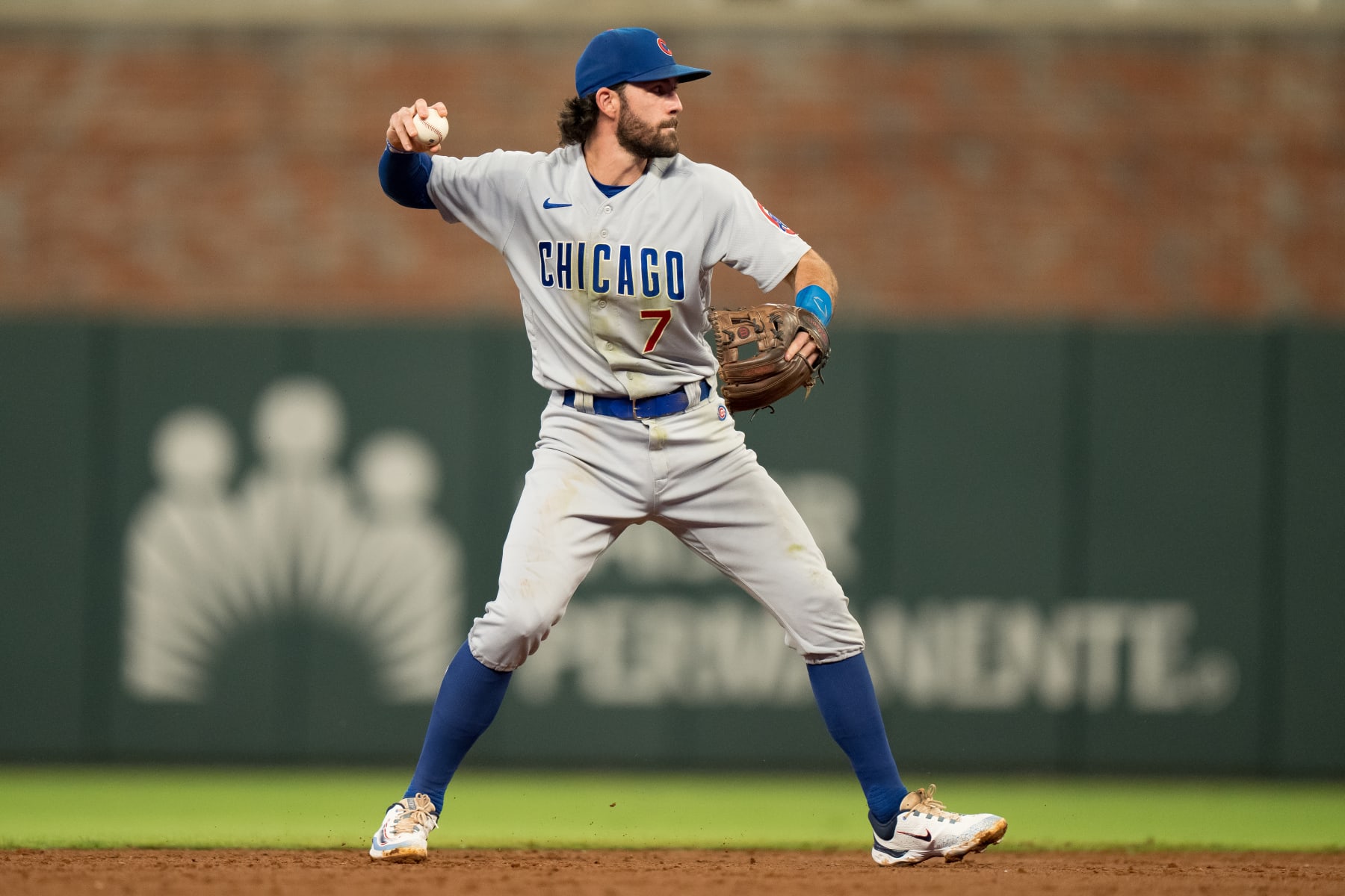 ATLANTA, GA - SEPTEMBER 28: Dansby Swanson #7 of the Chicago Cubs throws on to first base in a game against the Atlanta Braves at Truist Park on September 28, 2023 in Atlanta, Georgia. (Photo by Matt Dirksen/Getty Images)