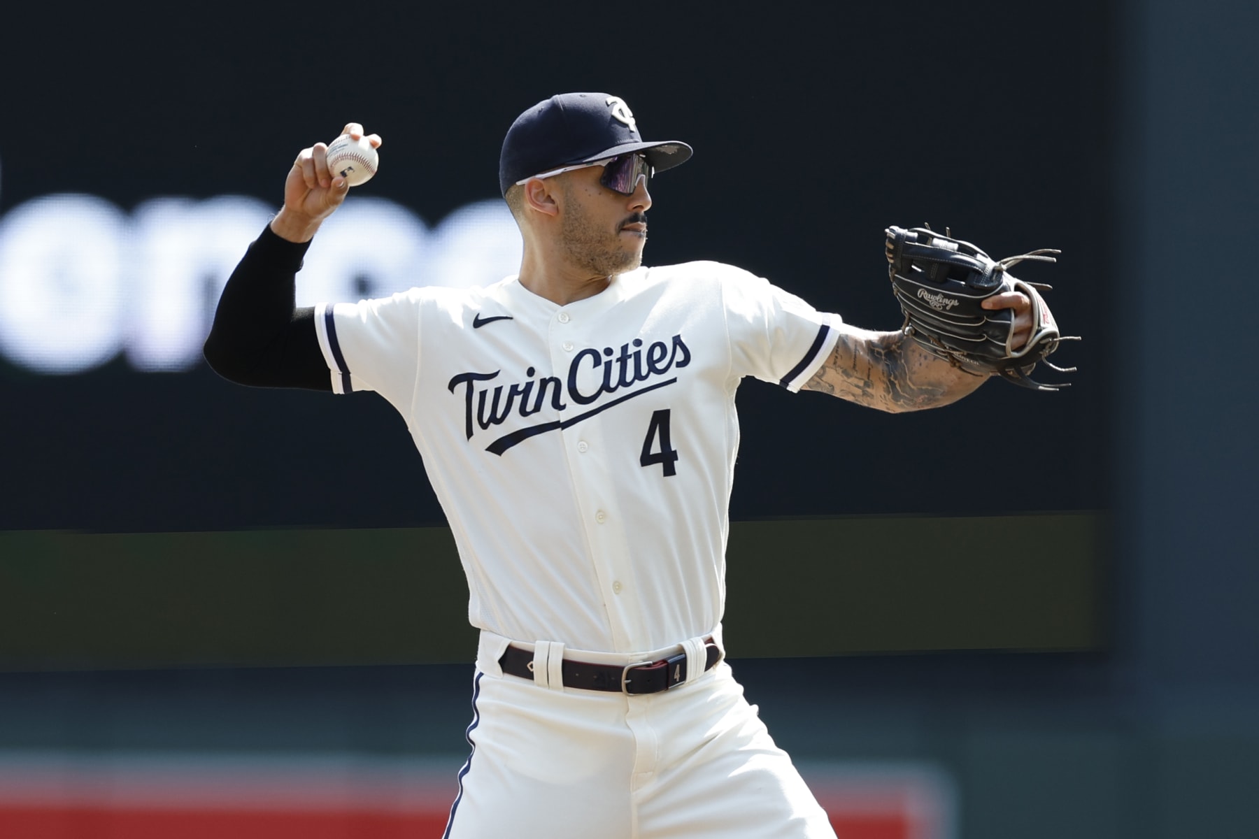 MINNEAPOLIS, MN - AUGUST 30: Carlos Correa #4 of the Minnesota Twins looks to throw the ball during the game between the Cleveland Guardians and the Minnesota Twins at Target Field on Wednesday, August 30, 2023 in Minneapolis, Minnesota. (Photo by David Berding/MLB Photos via Getty Images)
