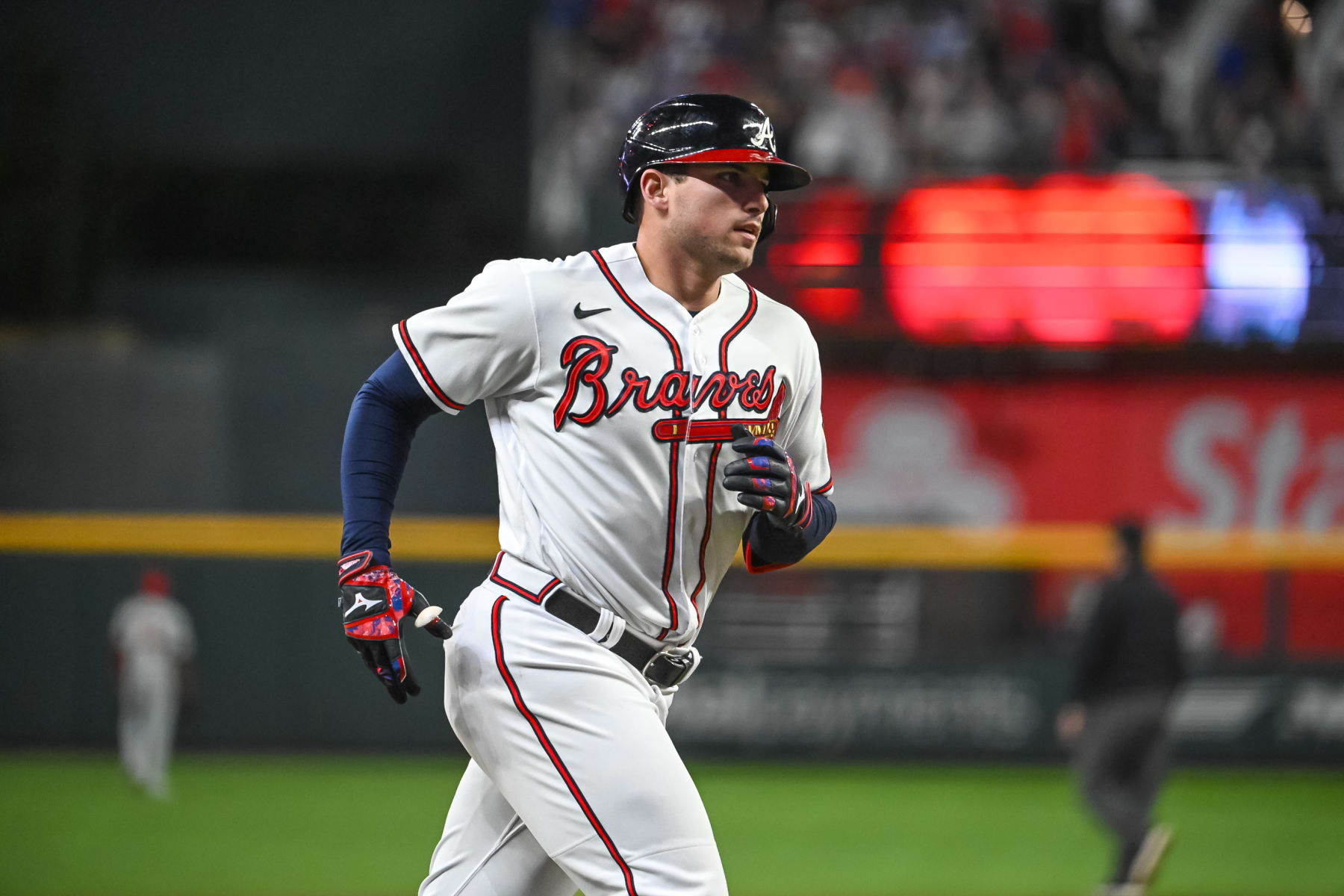 ATLANTA, GA - OCTOBER 09: Atlanta Braves third baseman Austin Riley (27) rounds third base after hitting a 2 run home run in the eighth inning to take a 5-4 lead in game 2 of the NLDS between the Philadelphia Phillies and Atlanta Braves on October 9, 2023, at Truist Park in Atlanta, GA. (Photo by John Adams/Icon Sportswire via Getty Images)