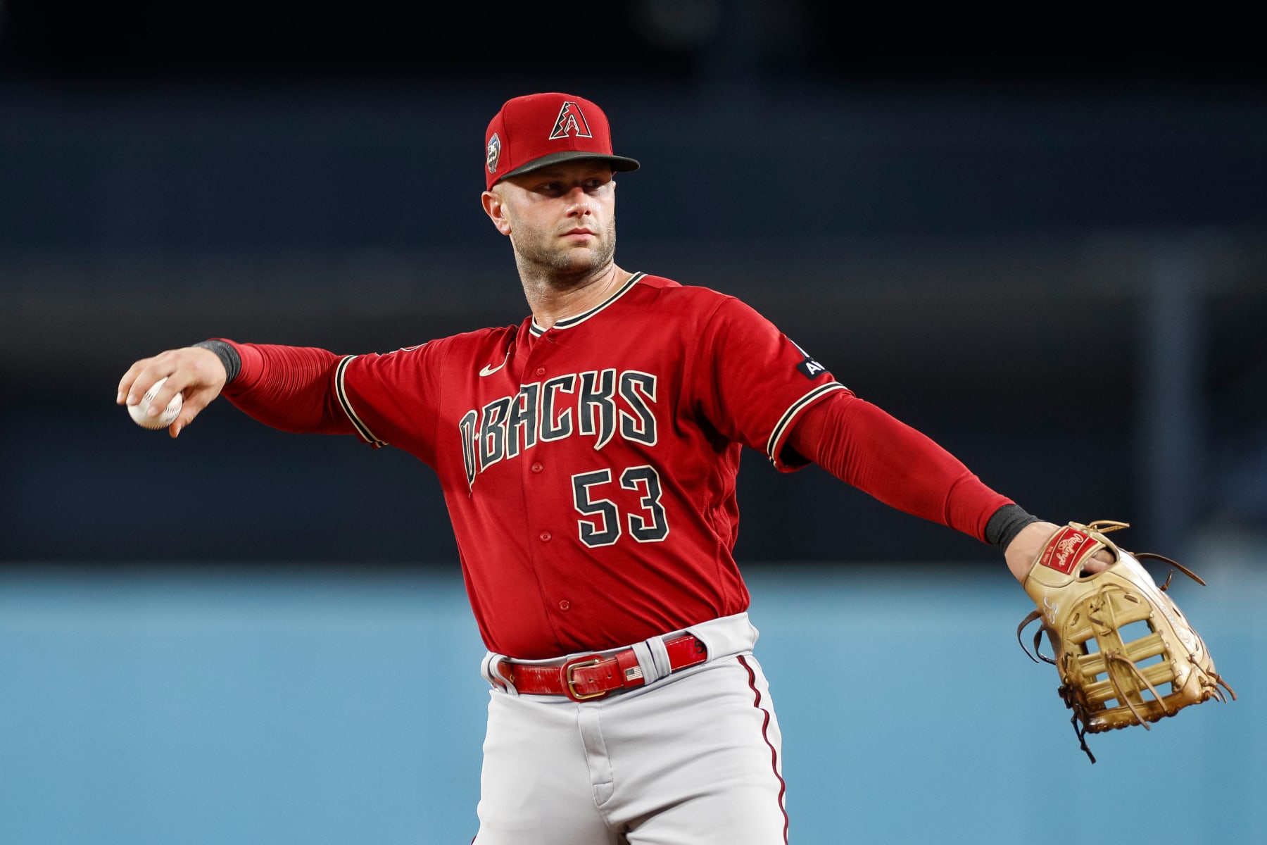 LOS ANGELES, CALIFORNIA - AUGUST 30: Christian Walker #53 of the Arizona Diamondbacks throws the ball during the second inning against the Los Angeles Dodgers at Dodger Stadium on August 30, 2023 in Los Angeles, California. (Photo by Brandon Sloter/Image Of Sport/Getty Images)