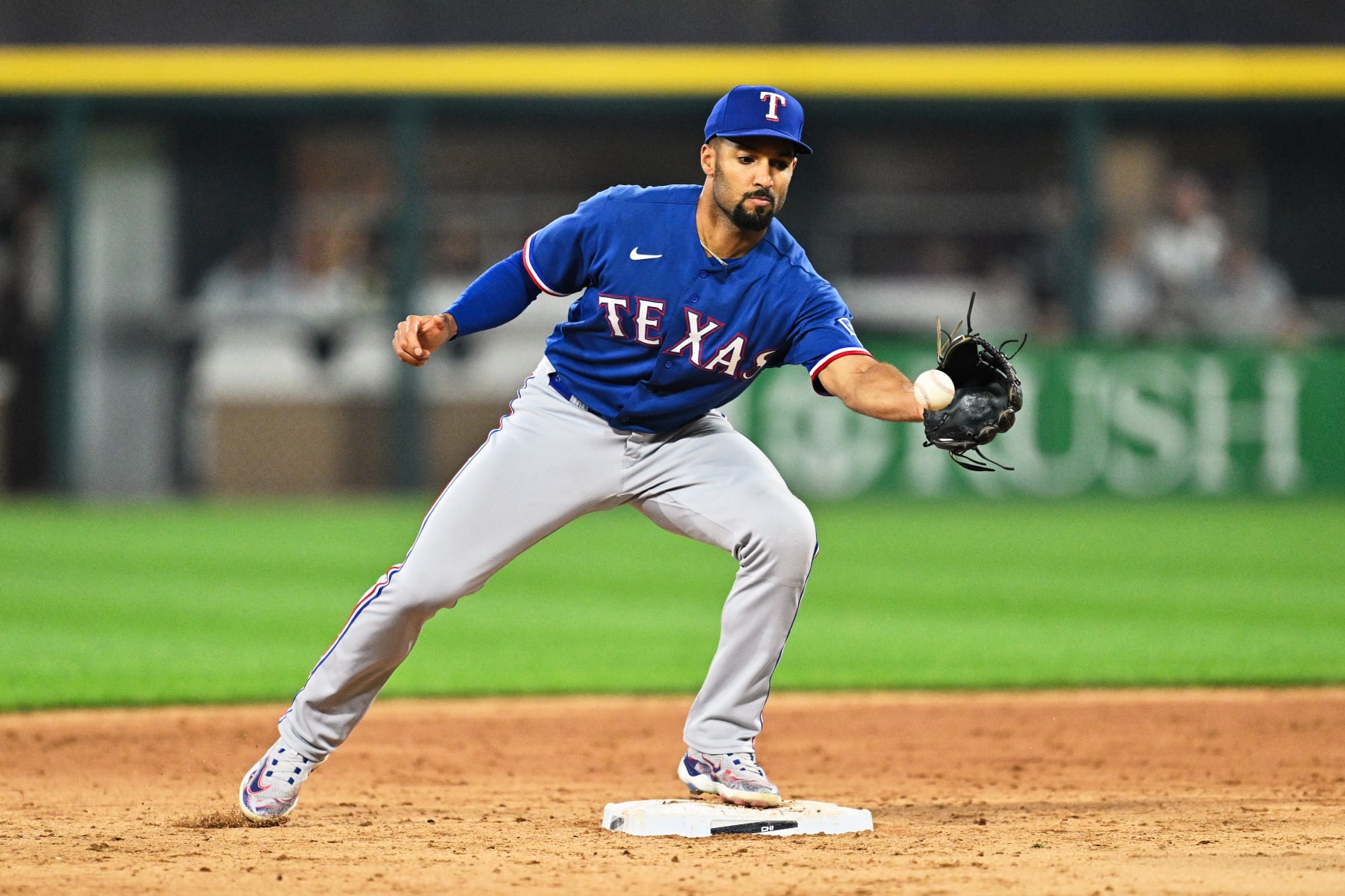 CHICAGO, IL - JUNE 21:  Marcus Semien #2 of the Texas Rangers takes a throw at second base against the Chicago White Sox at Guaranteed Rate Field on June 21, 2023 in Chicago, Illinois.   (Photo by Jamie Sabau/Getty Images)