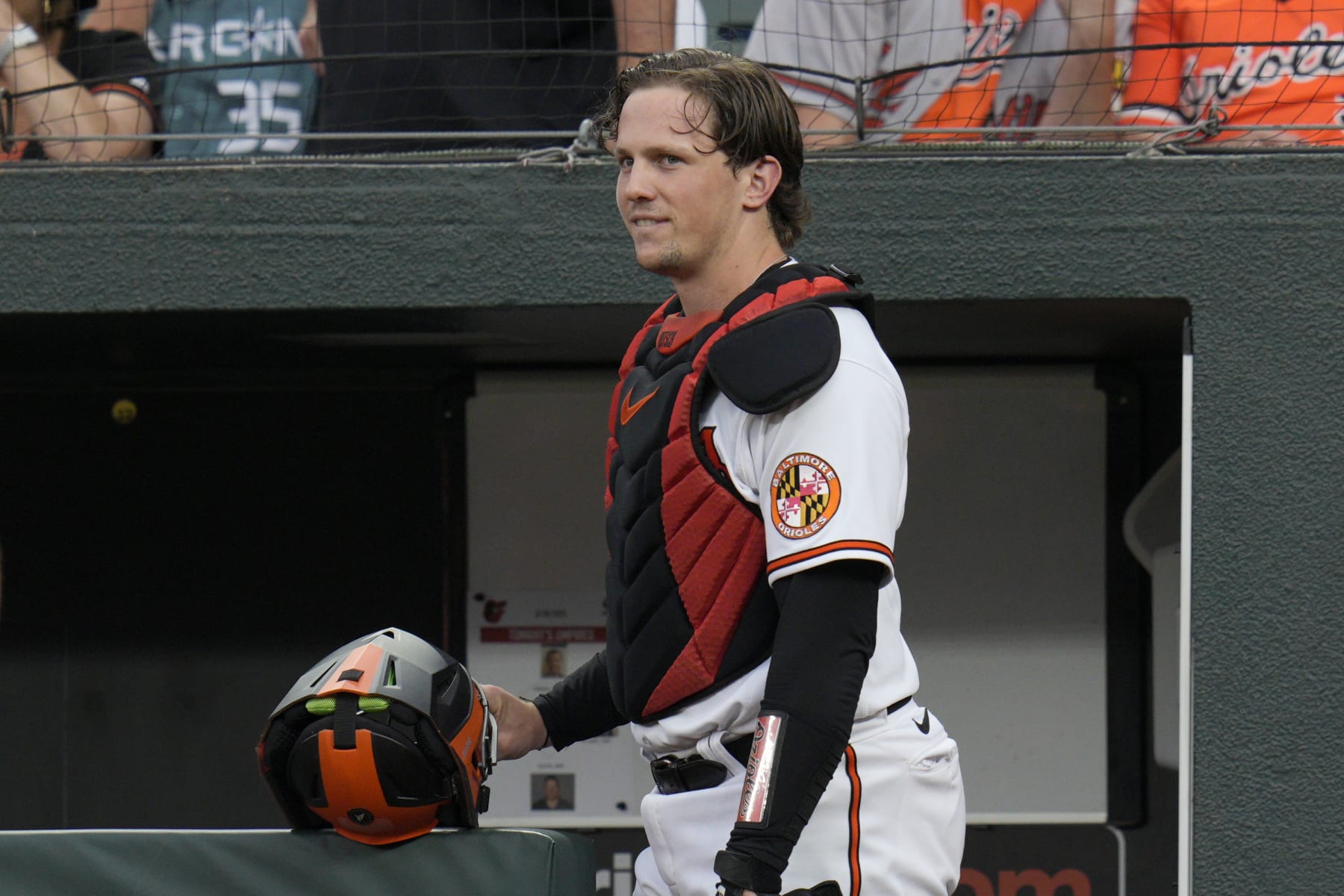 BALTIMORE, MARYLAND - AUGUST 28: Adley Rutschman #35 of the Baltimore Orioles looks on before taking the field against the Chicago White Sox at Oriole Park at Camden Yards on August 28, 2023 in Baltimore, Maryland. (Photo by Jess Rapfogel/Getty Images)
