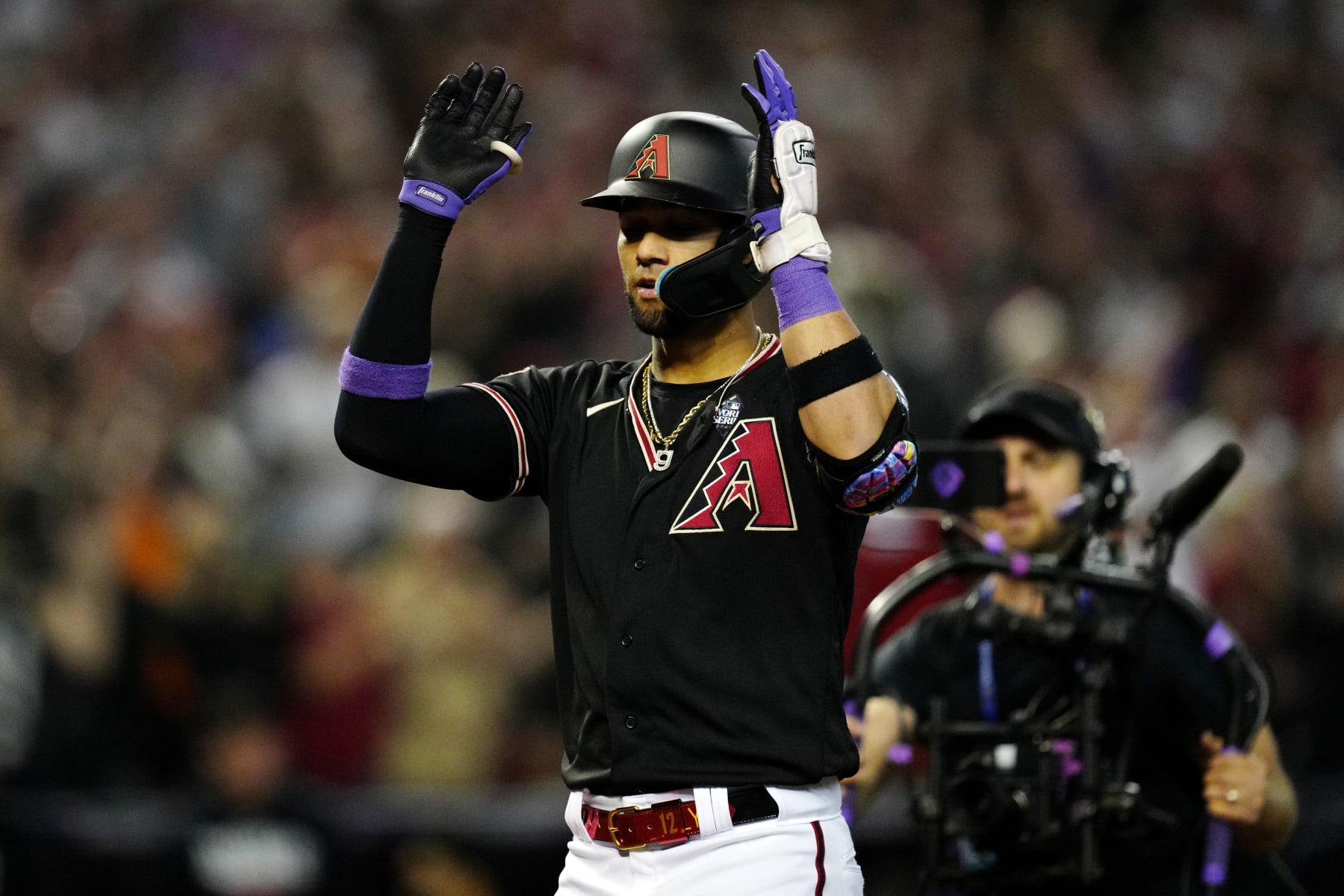 PHOENIX, AZ - OCTOBER 31:  Lourdes Gurriel Jr. #12 of the Arizona Diamondbacks celebrates as he touches home plate after hitting a three-run home run in the eighth inning during Game 4 of the 2023 World Series between the Texas Rangers and the Arizona Diamondbacks at Chase Field on Tuesday, October 31, 2023 in Phoenix, Arizona. (Photo by Mary DeCicco/MLB Photos via Getty Images)