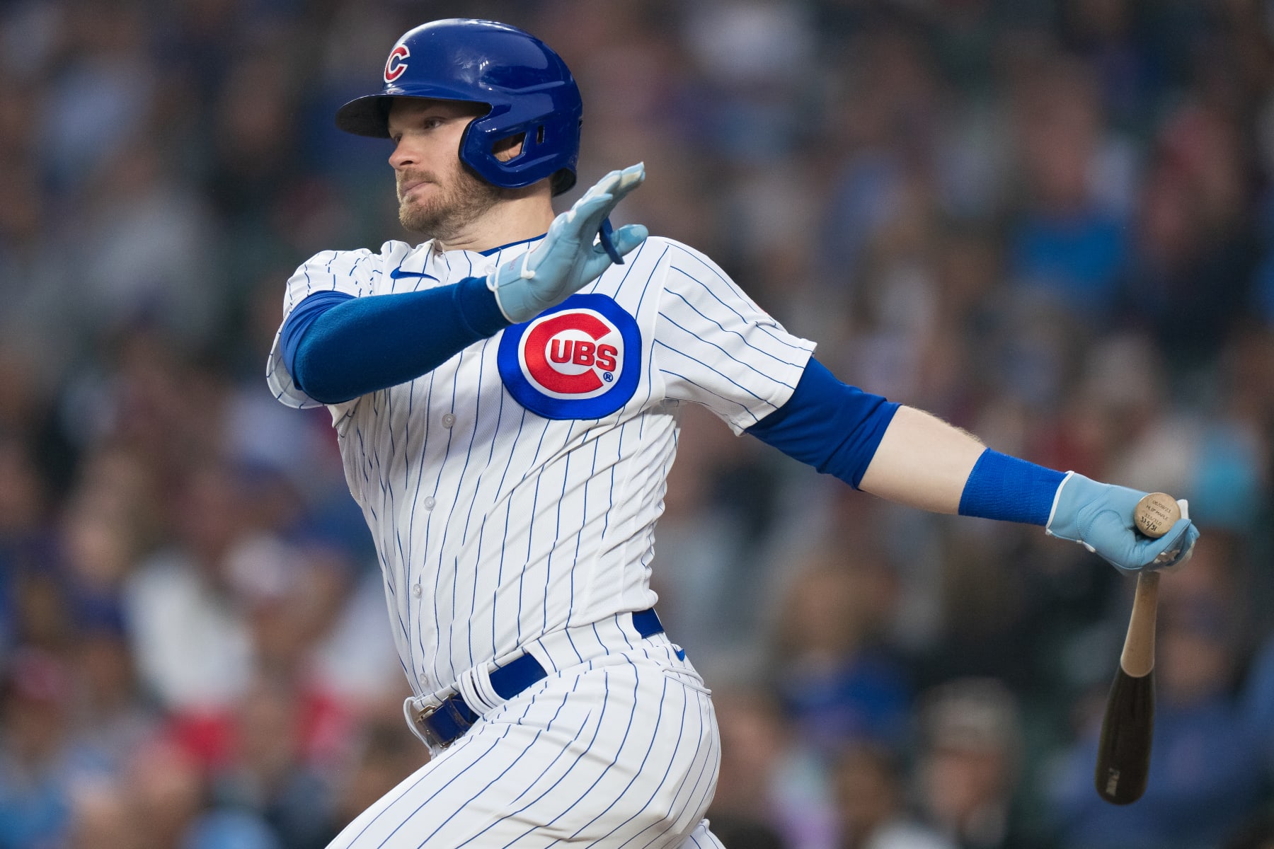 CHICAGO, IL - JUNE 27: Ian Happ of the Chicago Cubs watches the flight of the ball in a game against the Philadelphia Phillies at Wrigley Field on June 27, 2023 in Chicago, Illinois. (Photo by Matt Dirksen/Getty Images)