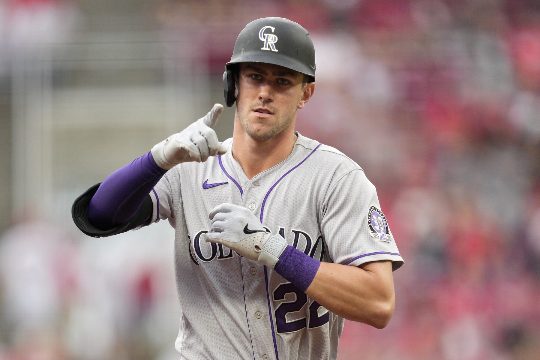 CINCINNATI, OHIO - JUNE 20: Nolan Jones #22 of the Colorado Rockies gestures after hitting a solo home run against the Cincinnati Reds in the first inning of a baseball game at Great American Ball Park on June 20, 2023 in Cincinnati, Ohio. (Photo by Jeff Dean/Getty Images)