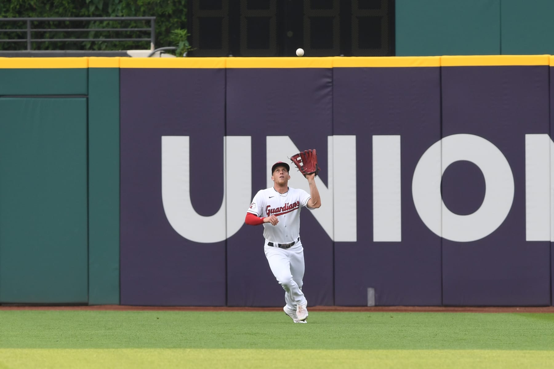 CLEVELAND, OHIO - JULY 24, 2023: Myles Straw #7 of the Cleveland Guardians fields a fly ball during the first inning against the Kansas City Royals at Progressive Field on July 24, 2023 in Cleveland, Ohio. (Photo by George Kubas/Diamond Images via Getty Images)