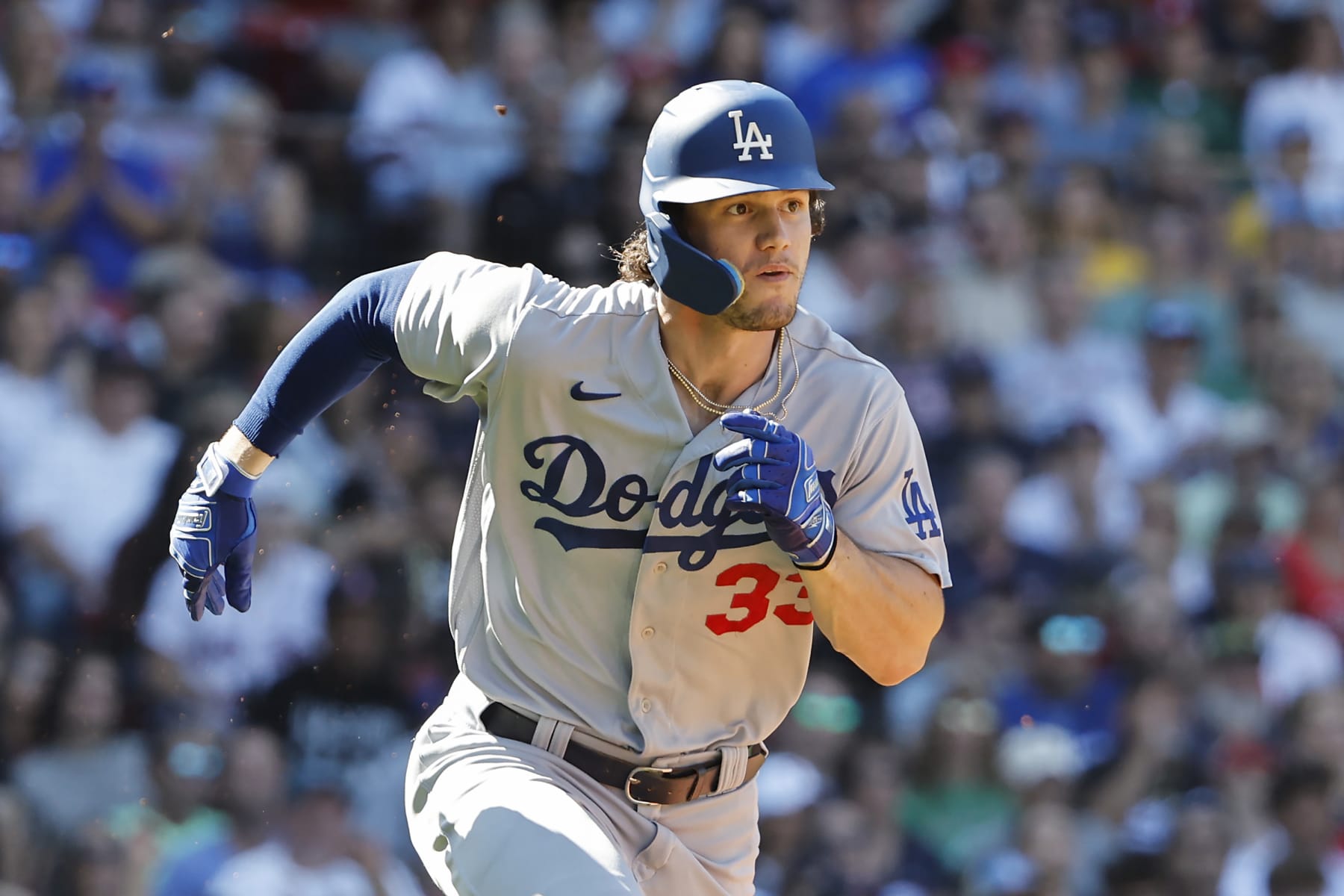 BOSTON, MA - AUGUST 27: James Outman #33 of the Los Angeles Dodgers runs out a hit against the Boston Red Sox during the eighth inning at Fenway Park on August 27, 2023 in Boston, Massachusetts. (Photo By Winslow Townson/Getty Images)