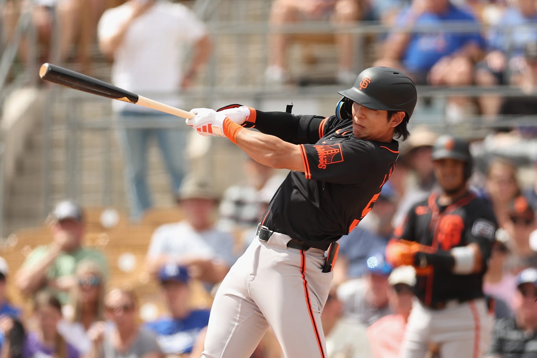 GLENDALE, ARIZONA - MARCH 12: Jung Hoo Lee #51 of the San Francisco Giants bats against the Los Angeles Dodgers during the first inning of the MLB spring game at Camelback Ranch on March 12, 2024 in Glendale, Arizona. (Photo by Christian Petersen/Getty Images)