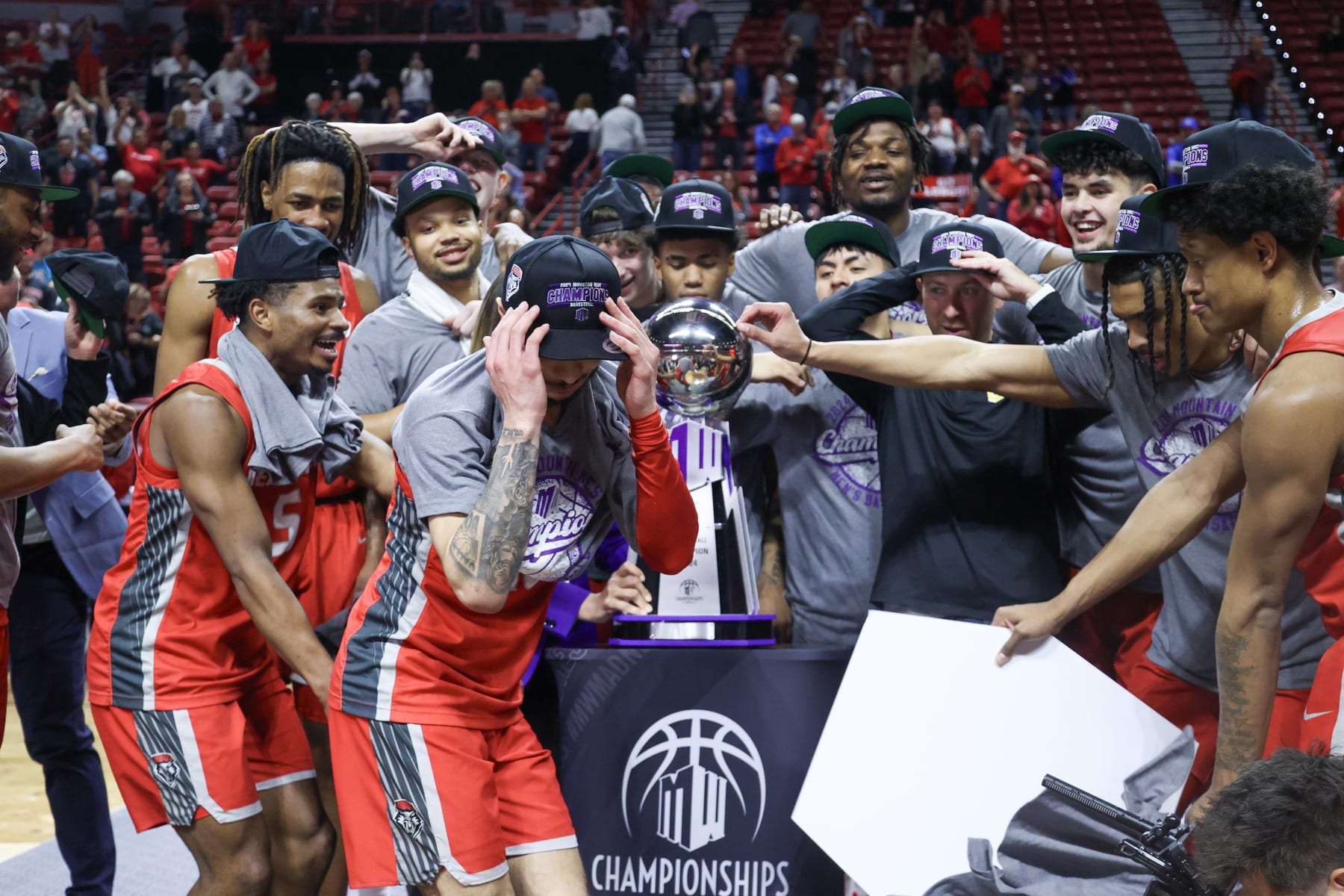 LAS VEGAS, NEVADA - MARCH 16: Jaelen House #10 of the New Mexico Lobos dances while celebrating with teammates after defeating the San Diego State Aztecs in the championship game of the Mountain West basketball tournament at the Thomas & Mack Center on March 16, 2024 in Las Vegas, Nevada. The Lobos won 68-61. (Photo by Ian Maule/Getty Images)