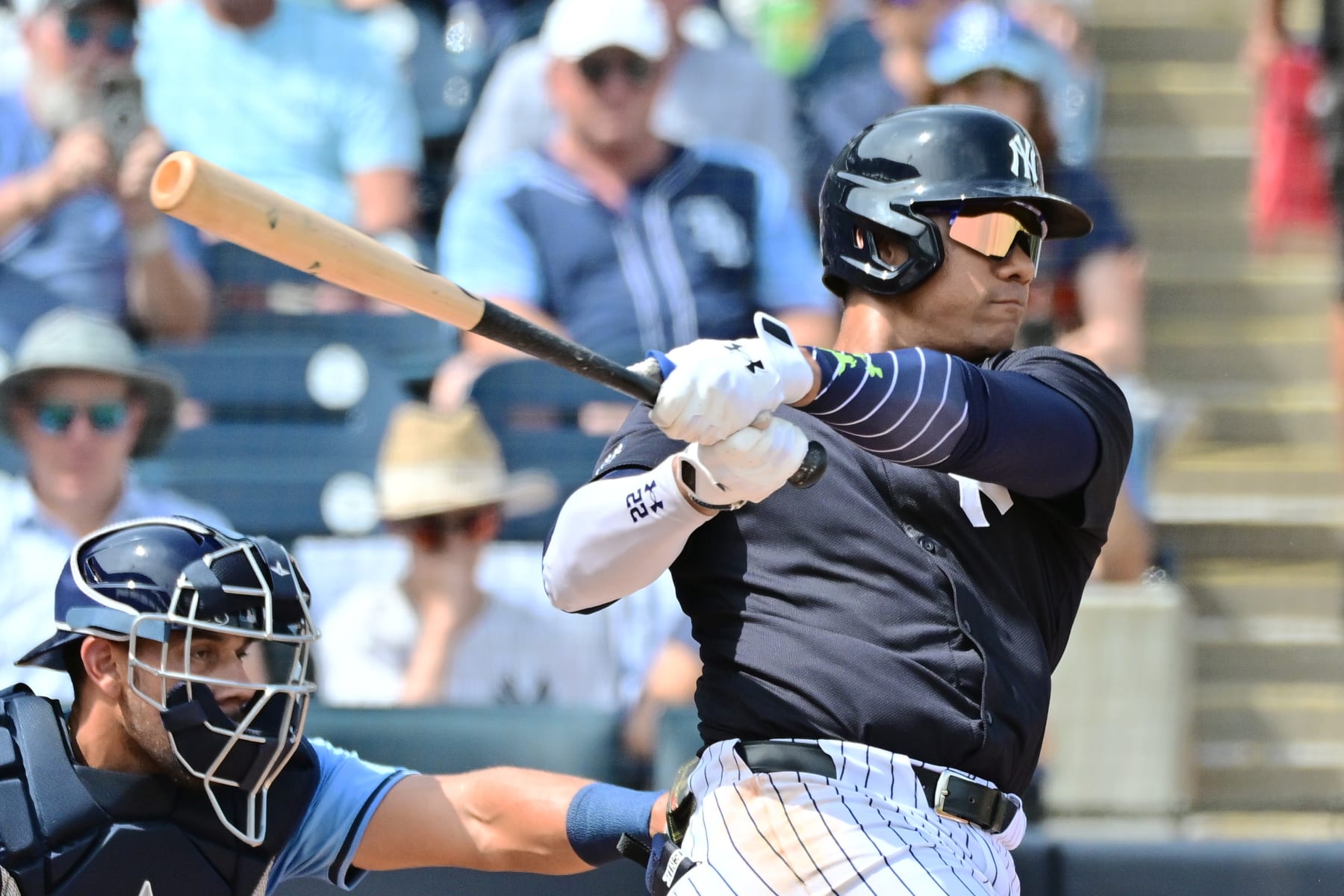 TAMPA, FLORIDA - MARCH 06: Juan Soto #22 of the New York Yankees hits a single in the first inning against the Tampa Bay Rays during a 2024 Grapefruit League Spring Training game at George M. Steinbrenner Field on March 06, 2024 in Tampa, Florida.  (Photo by Julio Aguilar/Getty Images)
