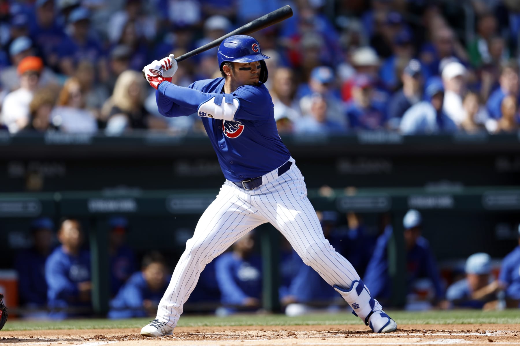 MESA, ARIZONA - MARCH 14: Seiya Suzuki #27 of the Chicago Cubs bats during a spring training game against the Oakland Athletics at Sloan Park on March 14, 2024 in Mesa, Arizona.  (Photo by Chris Coduto/Getty Images)