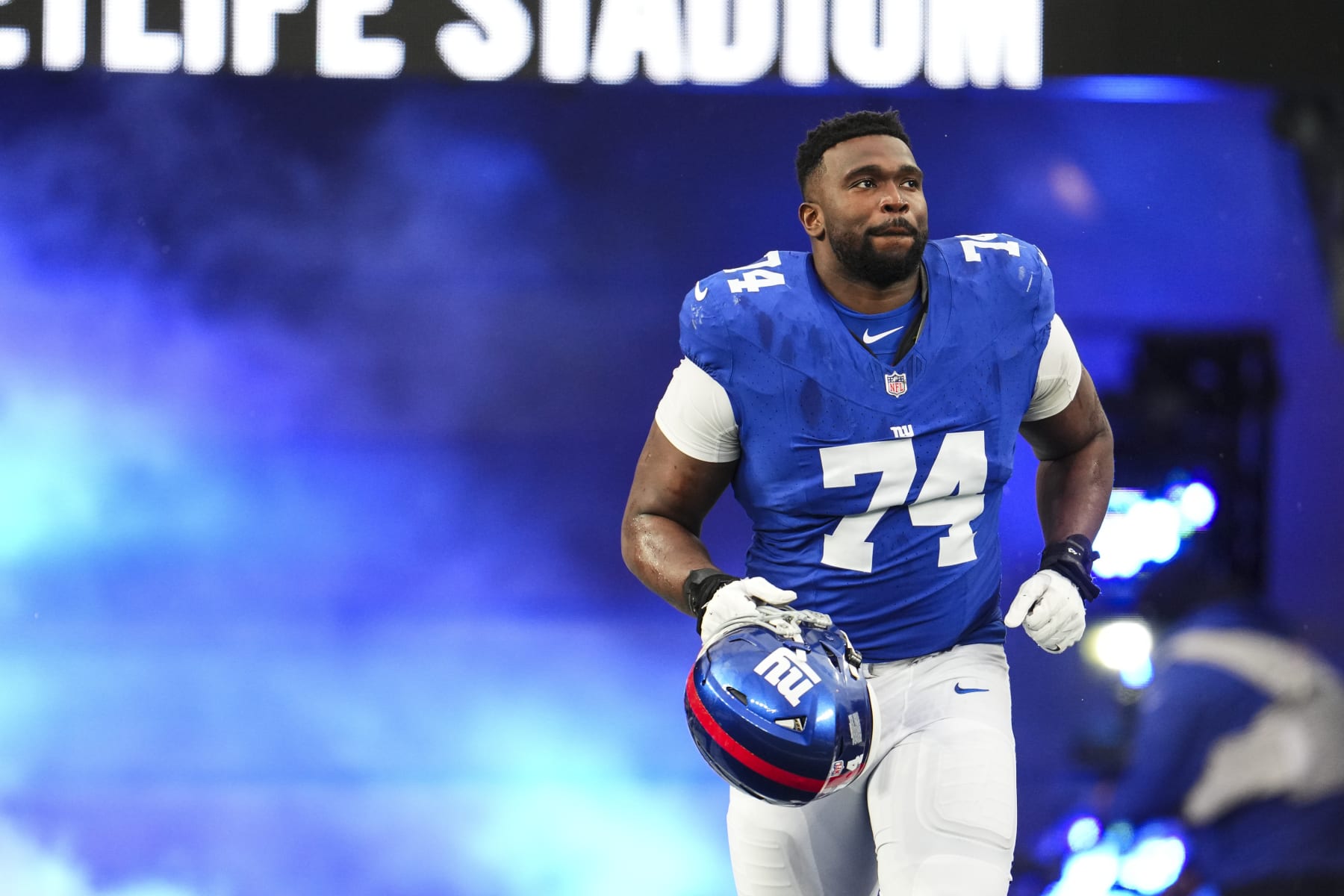EAST RUTHERFORD, NJ - JANUARY 07: Matt Peart #74 of the New York Giants runs out of the tunnel prior to an NFL football game against the Philadelphia Eagles at MetLife Stadium on January 7, 2024 in East Rutherford, New Jersey. (Photo by Cooper Neill/Getty Images) EAST RUTHERFORD, NJ - JANUARY 07: Matt Peart #74 of the New York Giants runs out of the tunnel prior to an NFL football game against the Philadelphia Eagles at MetLife Stadium on January 7, 2024 in East Rutherford, New Jersey. (Photo by Cooper Neill/Getty Images)