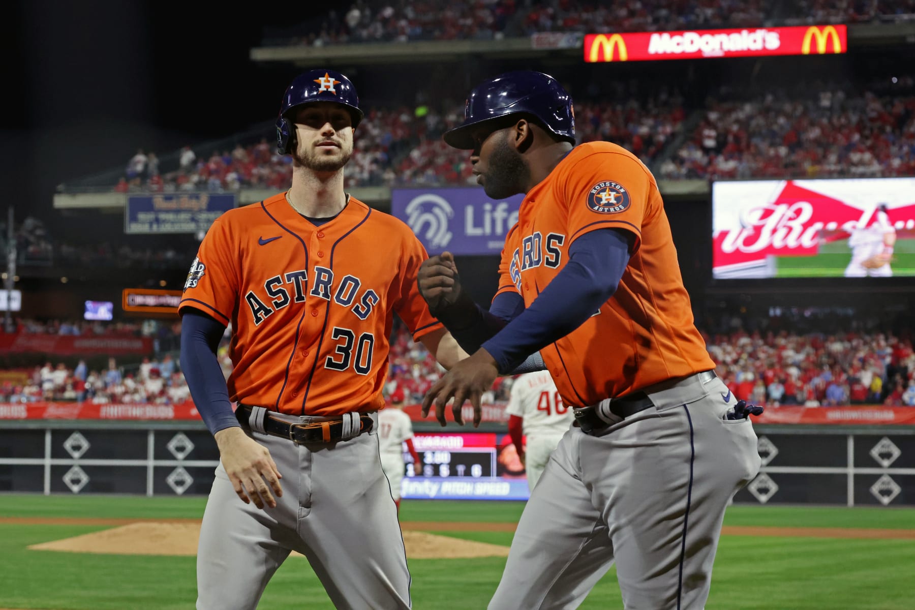 PHILADELPHIA, PA - NOVEMBER 02:  Yordan Alvarez #44 of the Houston Astros is greeted by teammate Kyle Tucker #30 after scoring a run in the fifth inning during Game 4 of the 2022 World Series between the Houston Astros and the Philadelphia Phillies at Citizens Bank Park on Wednesday, November 2, 2022 in Philadelphia, Pennsylvania. (Photo by Mary DeCicco/MLB Photos via Getty Images)