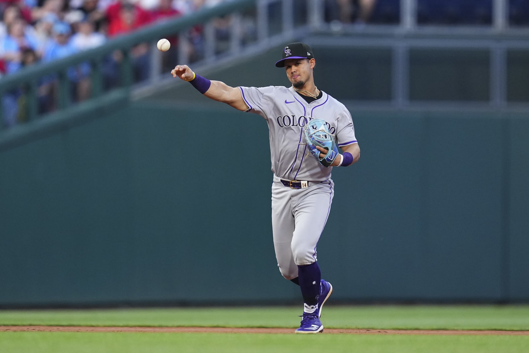 PHILADELPHIA, PENNSYLVANIA - APRIL 16: Ezequiel Tovar #14 of the Colorado Rockies throws the ball to first base against the Philadelphia Phillies at Citizens Bank Park on April 16, 2024 in Philadelphia, Pennsylvania. The Phillies defeated the Rockies 5-0. (Photo by Mitchell Leff/Getty Images)