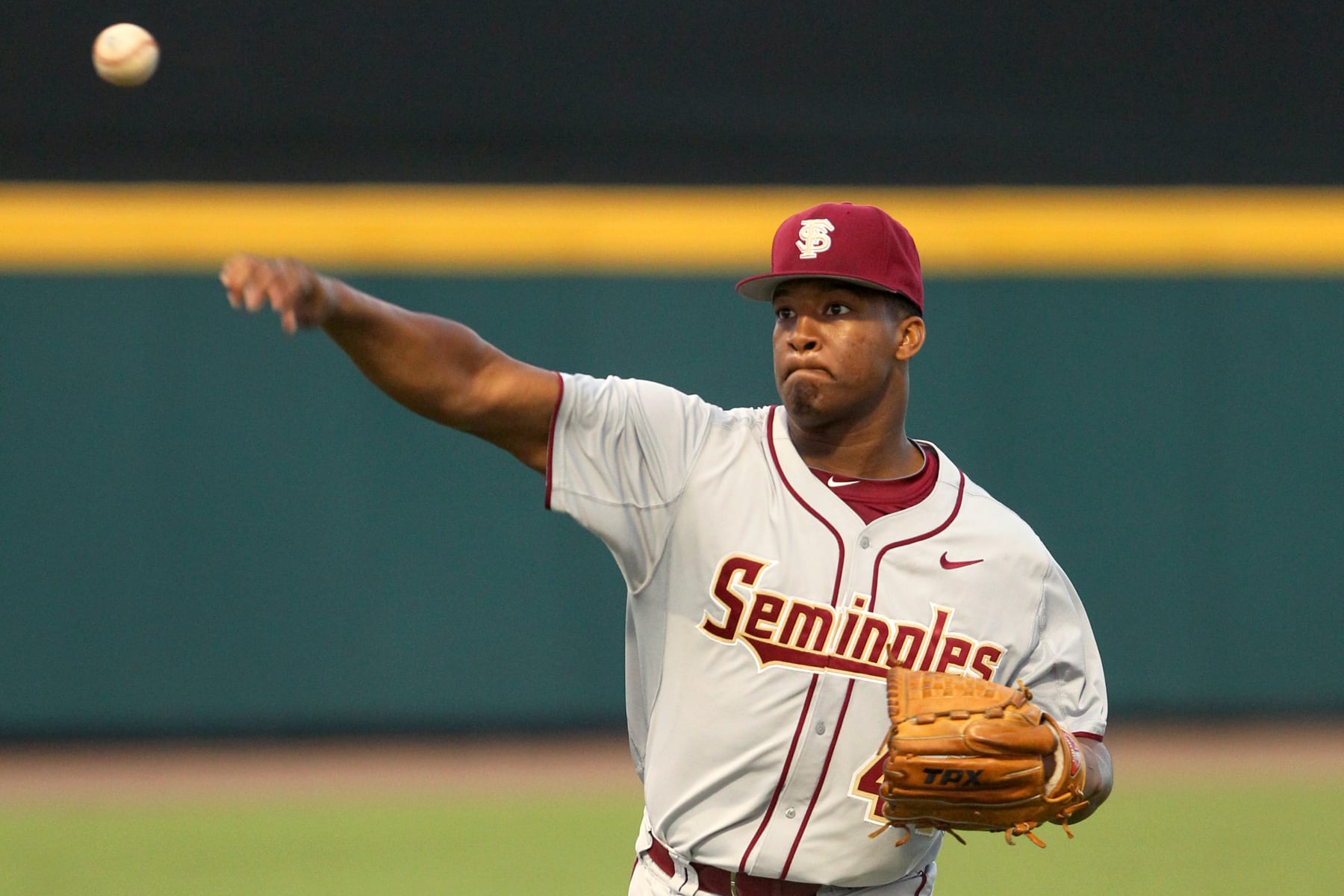 28 APR 2013: Heisman Trophy winning quarterback and current Florida State outfielder/pitcher Jameis Winston warming up before the NCAA college baseball game between the Florida State Seminoles and the South Florida Bulls at USF Baseball Stadium in Tampa, Florida. (Photo by Cliff Welch/Icon SMI/Corbis/Icon Sportswire via Getty Images)