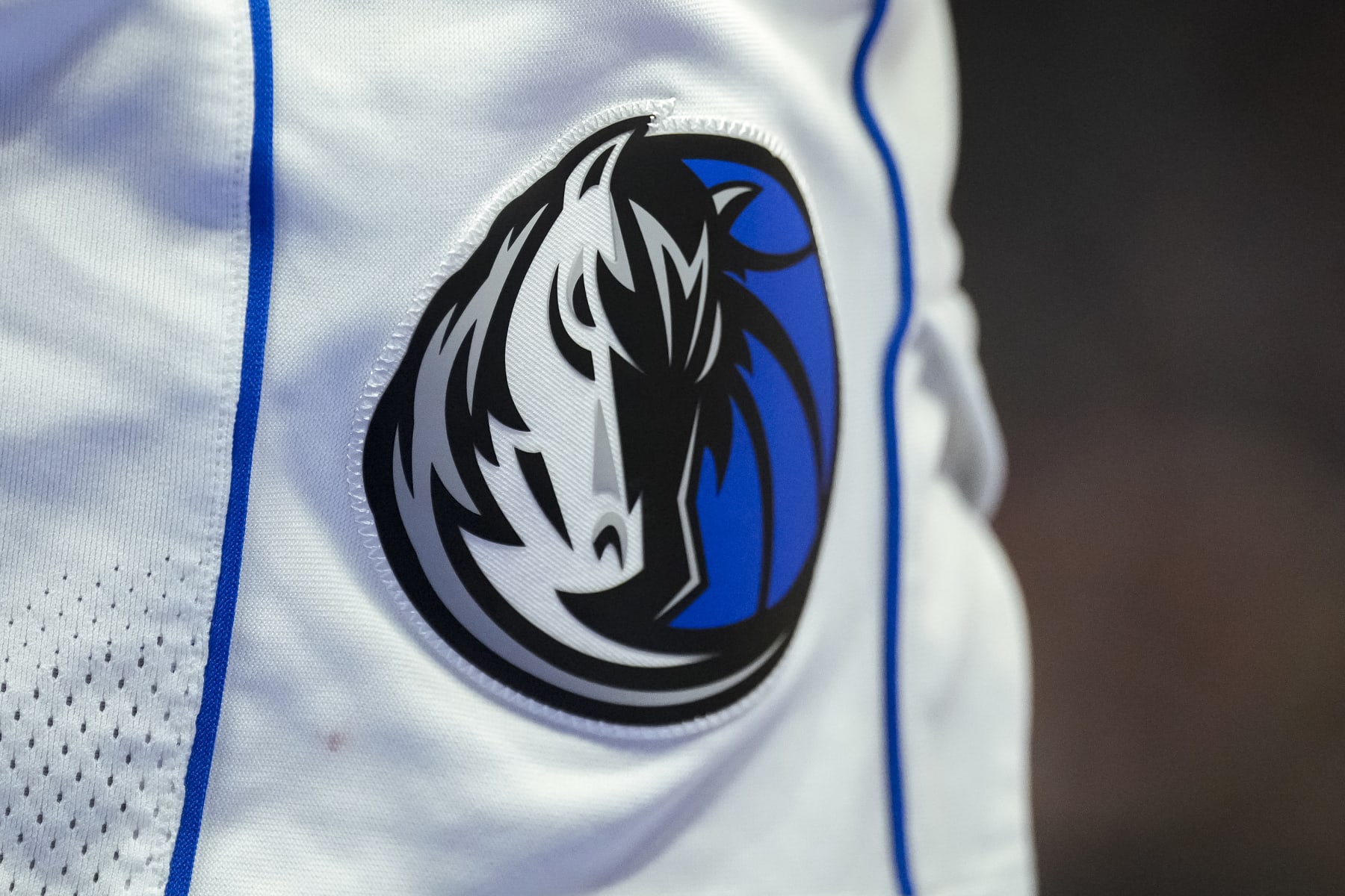 DETROIT, MICHIGAN - MARCH 09: The Dallas Mavericks logo is pictured on a uniform against the Detroit Pistons at Little Caesars Arena on March 09, 2024 in Detroit, Michigan. NOTE TO USER: User expressly acknowledges and agrees that, by downloading and or using this photograph, User is consenting to the terms and conditions of the Getty Images License Agreement. (Photo by Nic Antaya/Getty Images)