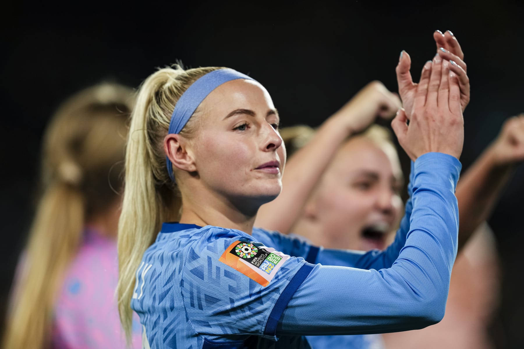 SYDNEY, AUSTRALIA - AUGUST 16: Chloe Kelly of England celebrates with her teammates after winning Australia during the FIFA Women's World Cup Australia & New Zealand 2023 Semi Final match between Australia and England at Stadium Australia on August 16, 2023 in Sydney, Australia. (Photo by Daniela Porcelli/Eurasia Sport Images/Getty Images)