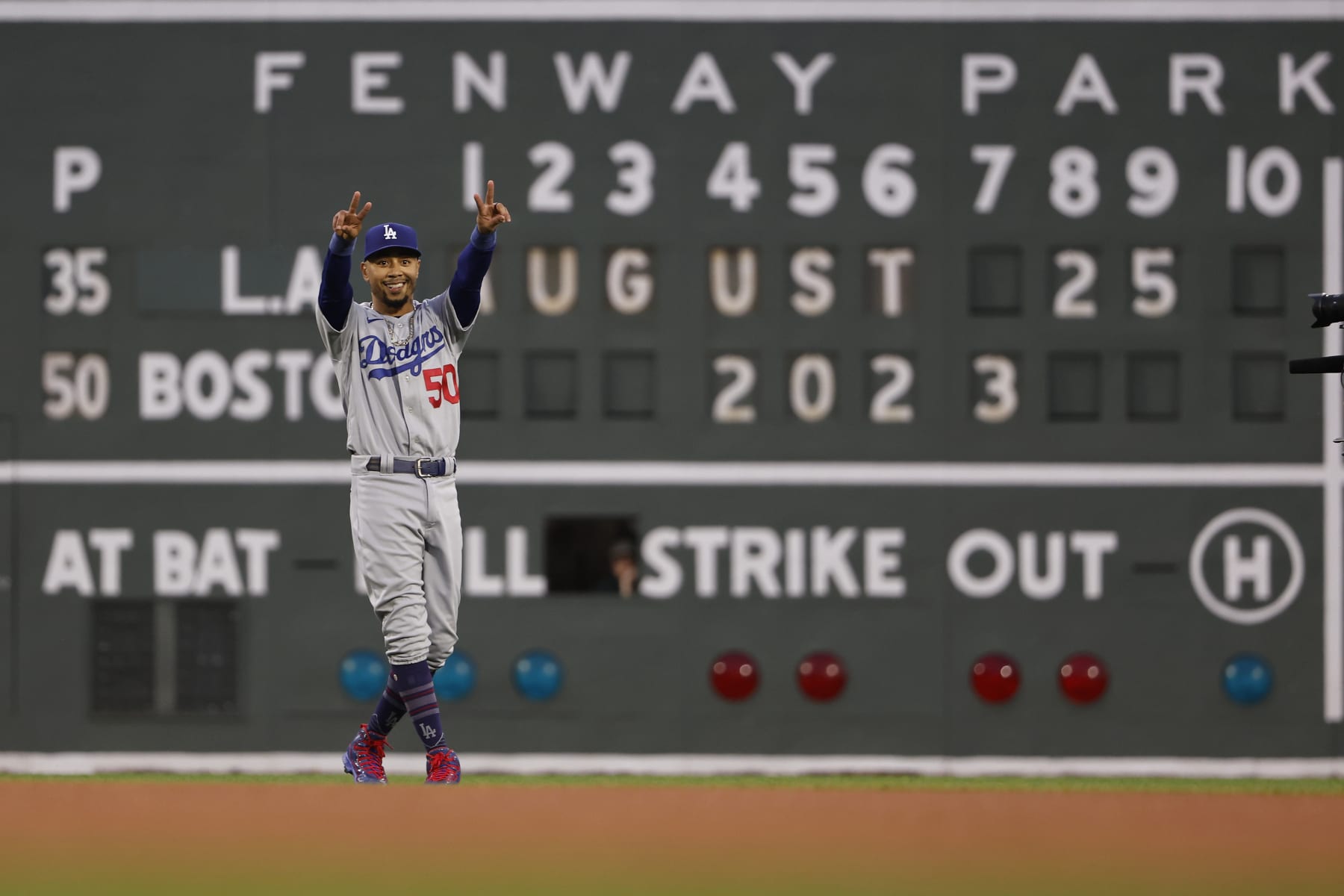 BOSTON, MA - AUGUST 25: Mookie Betts #50 of the Los Angeles Dodgers smiles at former teammates before the game against the Boston Red Sox at Fenway Park on August 25, 2023 in Boston, Massachusetts. (Photo By Winslow Townson/Getty Images)