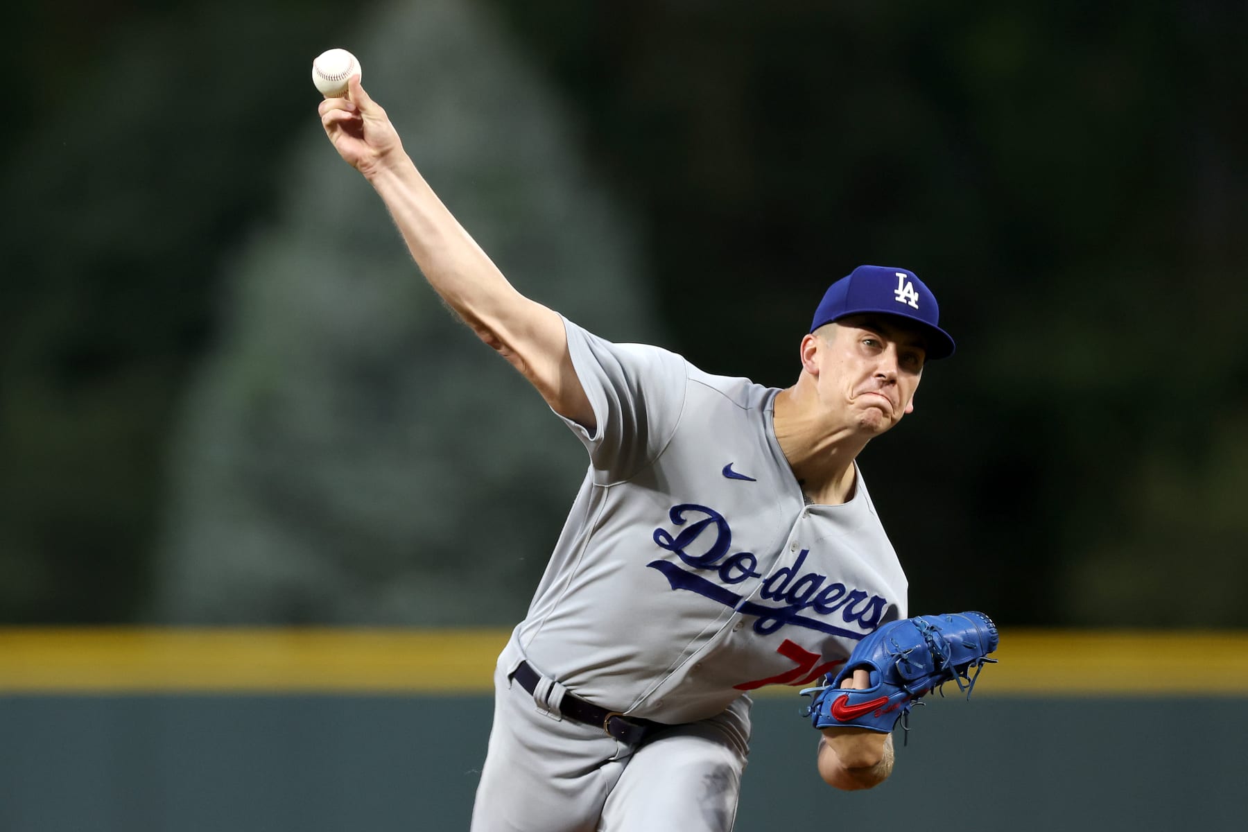 DENVER, COLORADO - SEPTEMBER 26: Starting pitcher Bobby Miller #70 of the Los Angeles Dodgers throws against the Colorado Rockies in the first inning during Game Two of a Doubleheader at Coors Field on September 26, 2023 in Denver, Colorado. (Photo by Matthew Stockman/Getty Images)