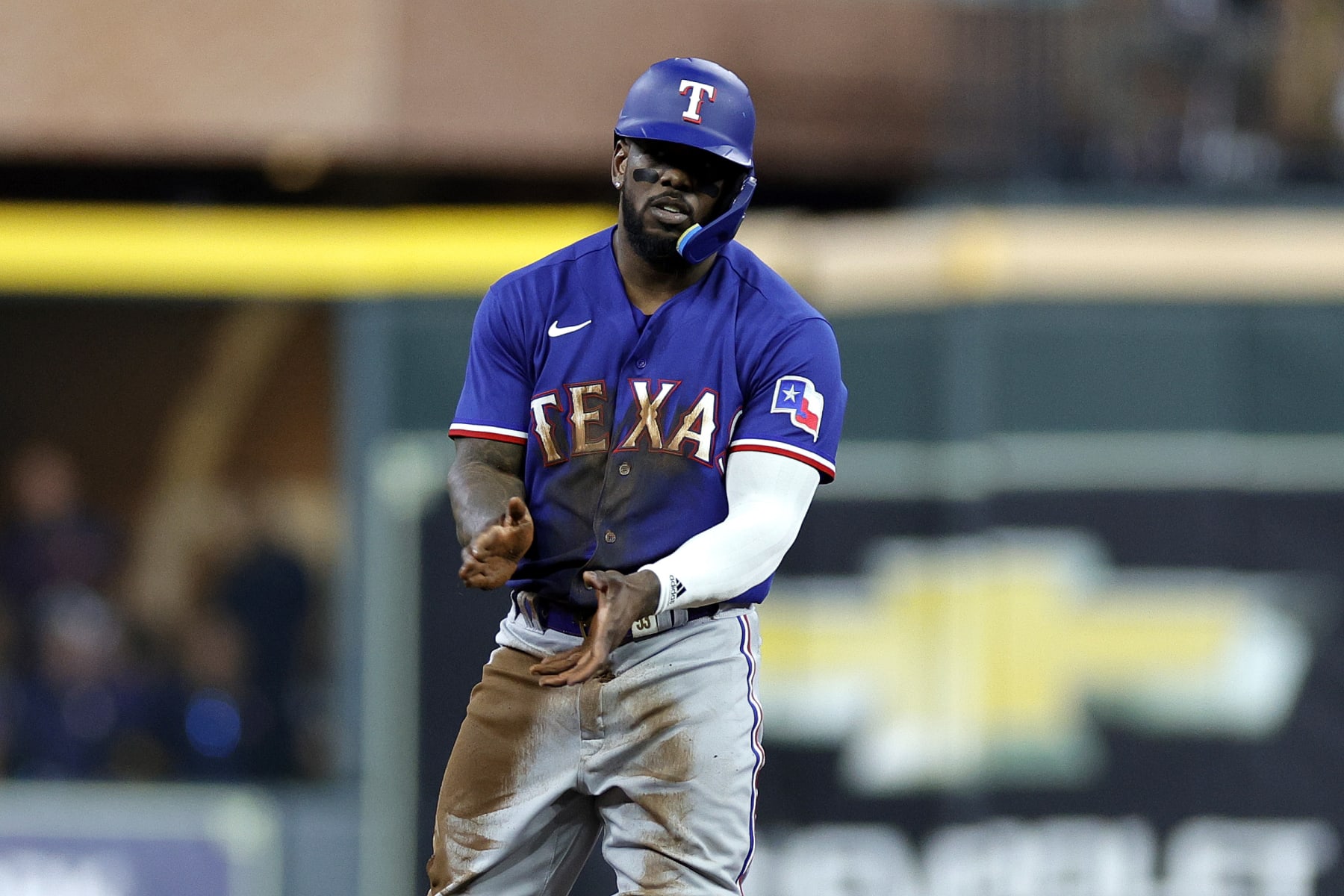 HOUSTON, TEXAS - OCTOBER 23: Adolis Garcia #53 of the Texas Rangers steals second base against the Houston Astros during the first inning in Game Seven of the American League Championship Series at Minute Maid Park on October 23, 2023 in Houston, Texas. (Photo by Carmen Mandato/Getty Images)
