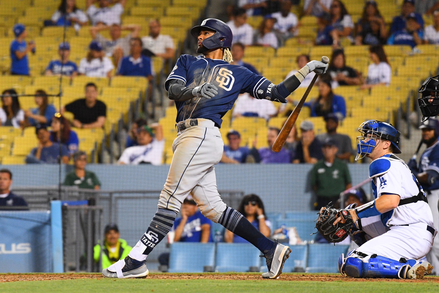 LOS ANGELES, CA - AUGUST 01: San Diego Padres infielder Fernando Tatis Jr. (23) swings at a pitch during a MLB game between the San Diego Padres and the Los Angeles Dodgers on August 1, 2019 at Dodger Stadium in Los Angeles, CA. (Photo by Brian Rothmuller/Icon Sportswire via Getty Images)