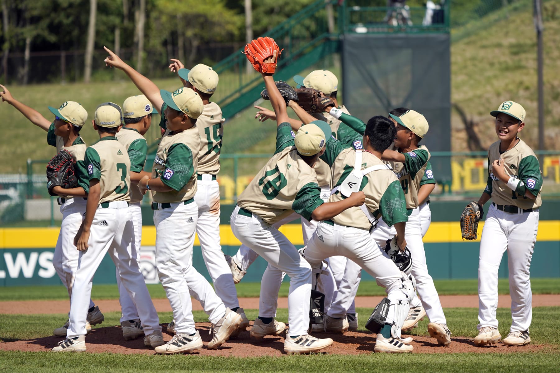 Taiwan celebrates after their 5-1 victory against Mexico during a baseball game at the Little League World Series tournament in South Williamsport, Pa., Wednesday, Aug. 24, 2022. AP Photo/Tom E. Puskar)
