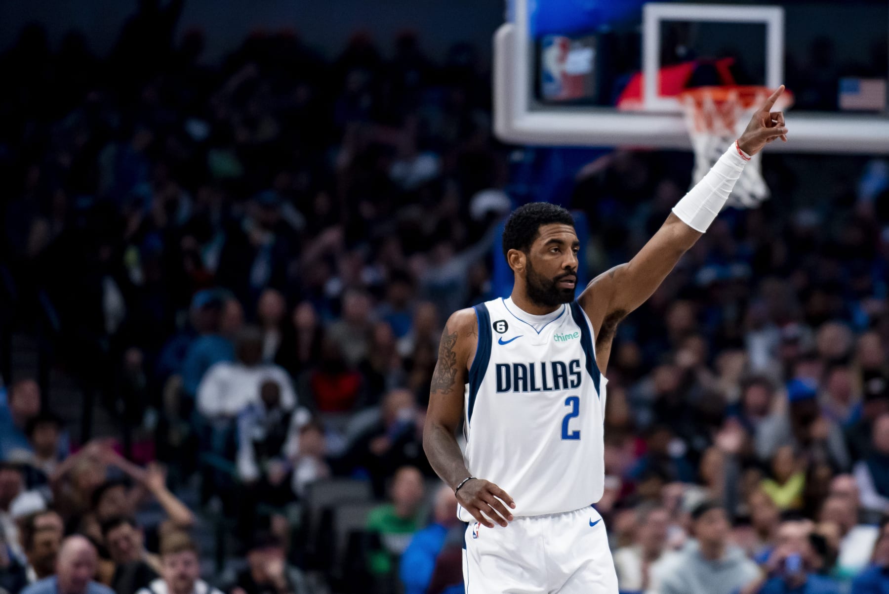 Dallas Mavericks guard Kyrie Irving (2) signals to a teammate in the second half of an NBA basketball game against the San Antonio Spurs on Thursday, Feb. 23, 2023, in Dallas. (AP Photo/Emil T. Lippe)
