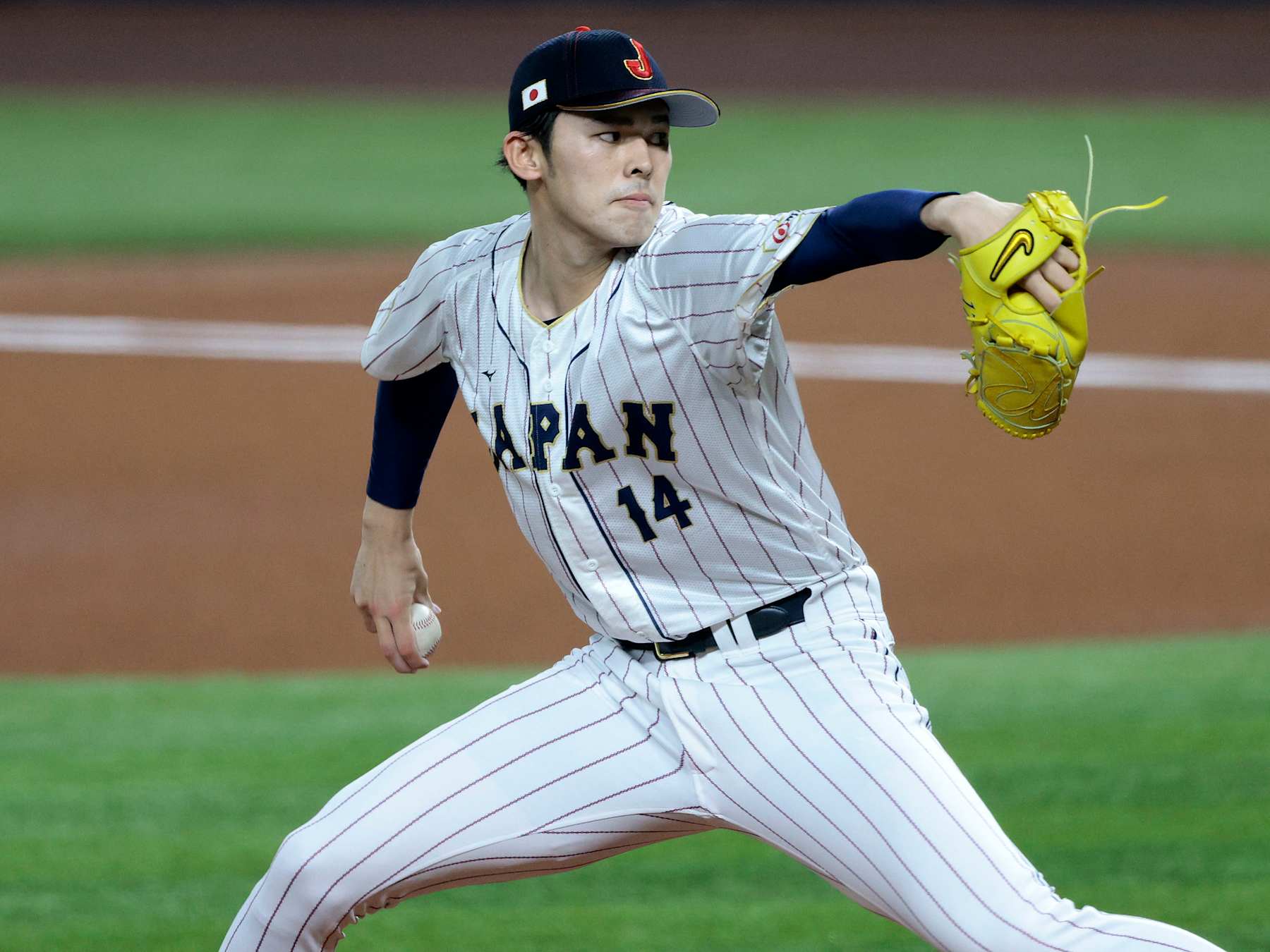 MIAMI, FL - MARCH 20: Roki Sasaki #14 of Team Japan pitches during the 2023 World Baseball Classic Semifinal game against Team Mexico at loanDepot Park on March 20, 2023 in Miami, Florida. (Photo by Christopher Pasatieri/Getty Images)