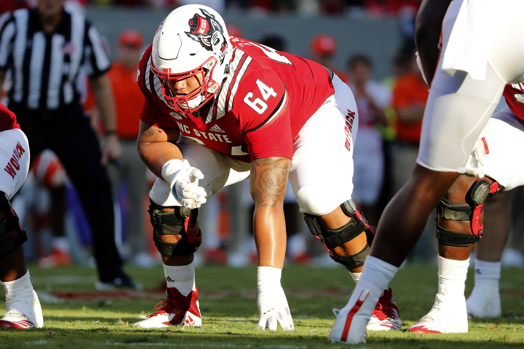 North Carolina State's Chandler Zavala (64) prepares to guard against Clemson during the second half of an NCAA college football game in Raleigh, N.C., Saturday, Sept. 25, 2021. (AP Photo/Karl B DeBlaker)