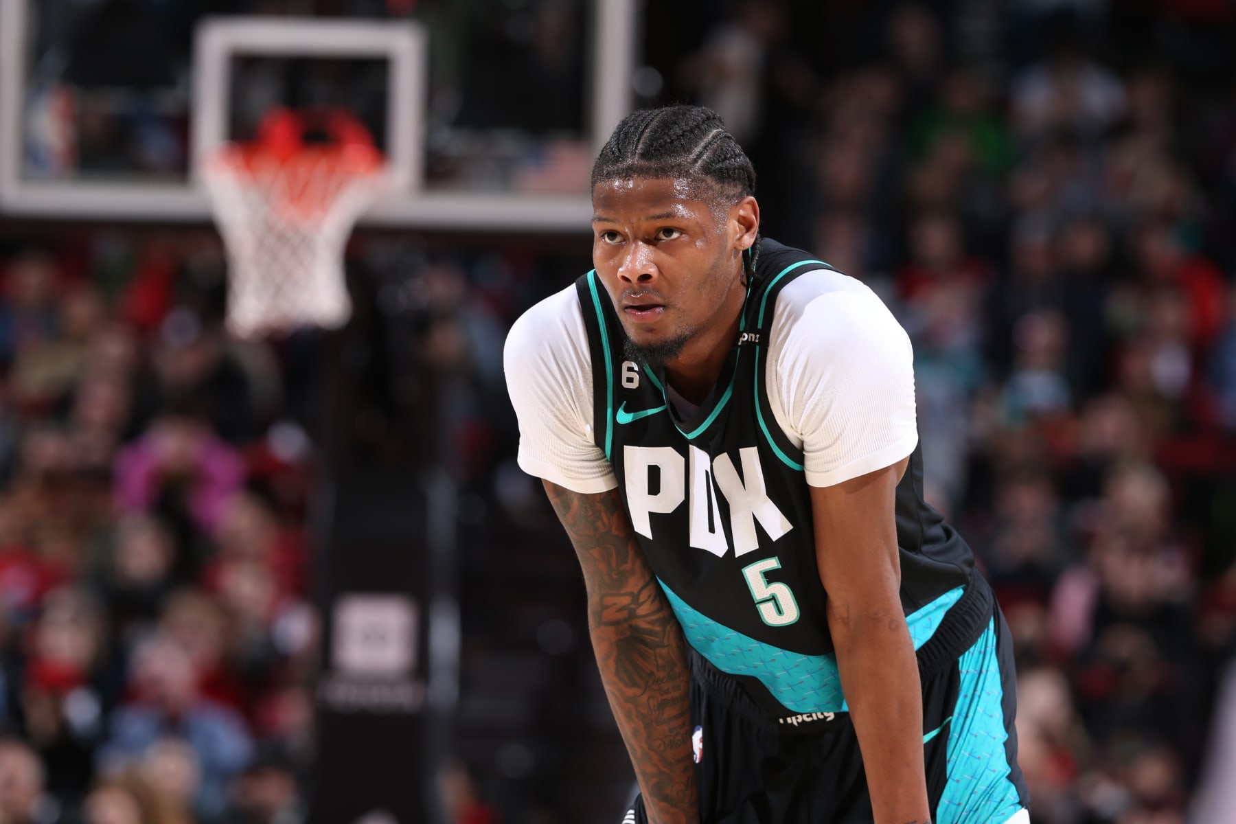 PORTLAND, OR - MARCH 27: Cam Reddish #5 of the Portland Trail Blazers looks on during the game against the New Orleans Pelicans on March 27, 2023 at the Moda Center Arena in Portland, Oregon. NOTE TO USER: User expressly acknowledges and agrees that, by downloading and or using this photograph, user is consenting to the terms and conditions of the Getty Images License Agreement. Mandatory Copyright Notice: Copyright 2023 NBAE (Photo by Sam Forencich/NBAE via Getty Images)