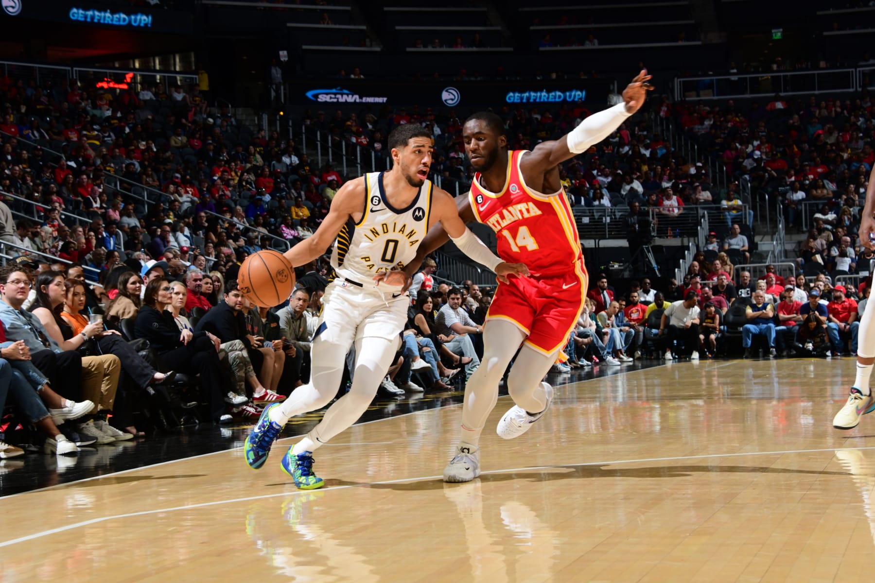ATLANTA, GA - MARCH 25: Tyrese Haliburton #0 of the Indiana Pacers dribbles the ball during the game against the Atlanta Hawks on March 25, 2023 at State Farm Arena in Atlanta, Georgia.  NOTE TO USER: User expressly acknowledges and agrees that, by downloading and/or using this Photograph, user is consenting to the terms and conditions of the Getty Images License Agreement. Mandatory Copyright Notice: Copyright 2023 NBAE (Photo by Scott Cunningham/NBAE via Getty Images)
