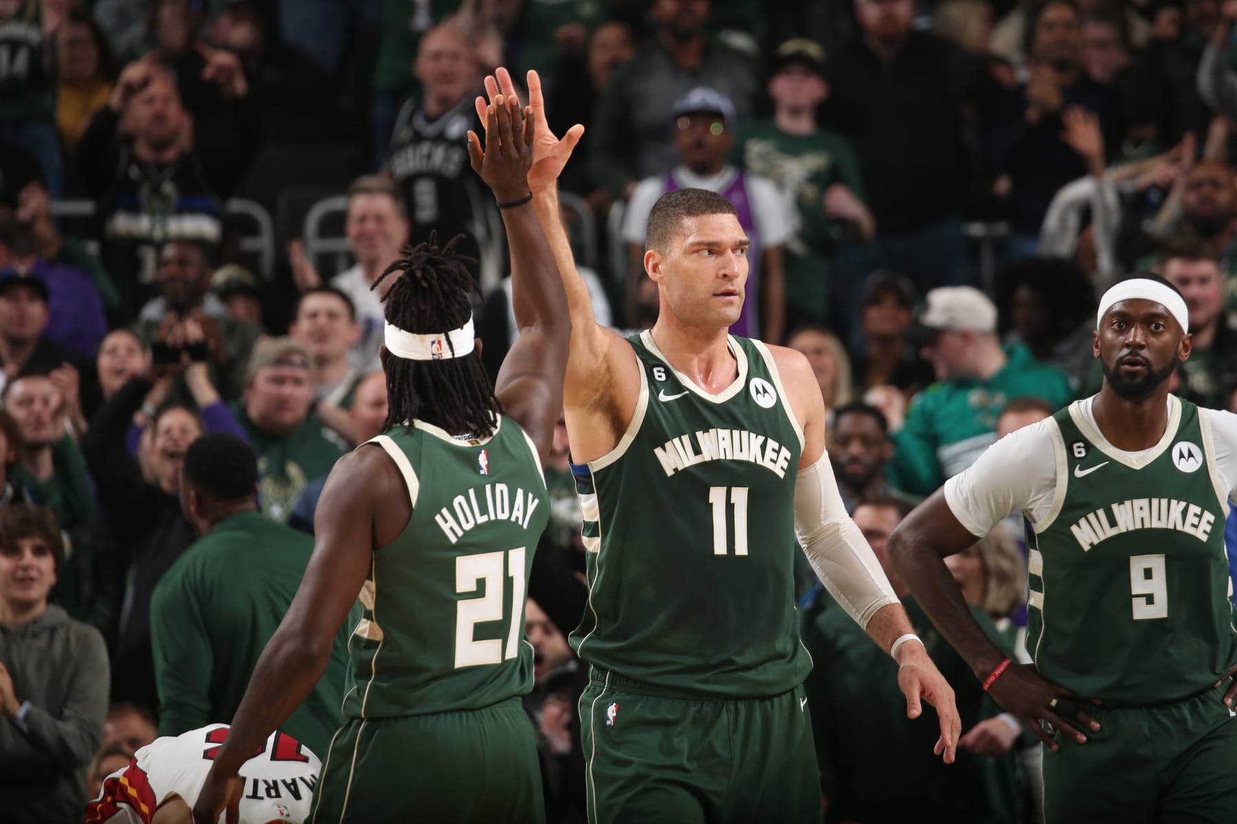 MILWAUKEE, WI - APRIL 26: Brook Lopez #11 of the Milwaukee Bucks celebrates a play during Round One Game Five of the 2023 NBA Playoffs on April 26, 2023 at the Fiserv Forum Center in Milwaukee, Wisconsin. NOTE TO USER: User expressly acknowledges and agrees that, by downloading and or using this Photograph, user is consenting to the terms and conditions of the Getty Images License Agreement. Mandatory Copyright Notice: Copyright 2023 NBAE (Photo by Gary Dineen/NBAE via Getty Images).