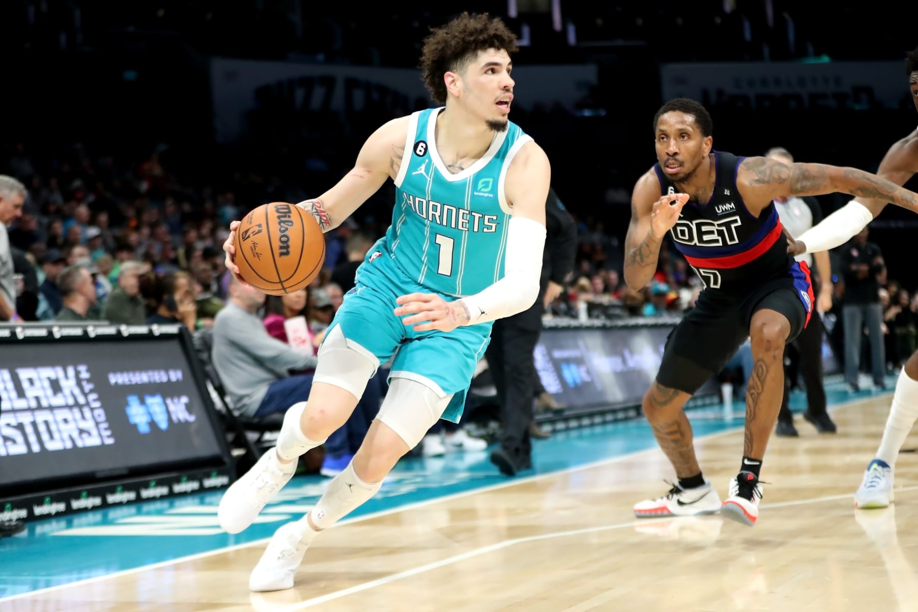 CHARLOTTE, NORTH CAROLINA - FEBRUARY 27: LaMelo Ball #1 of the Charlotte Hornets drives to the basket during the second half of their basketball game against the Detroit Pistons at Spectrum Center on February 27, 2023 in Charlotte, North Carolina. NOTE TO USER: User expressly acknowledges and agrees that, by downloading and or using this photograph, User is consenting to the terms and conditions of the Getty Images License Agreement. (Photo by David Jensen/Getty Images)