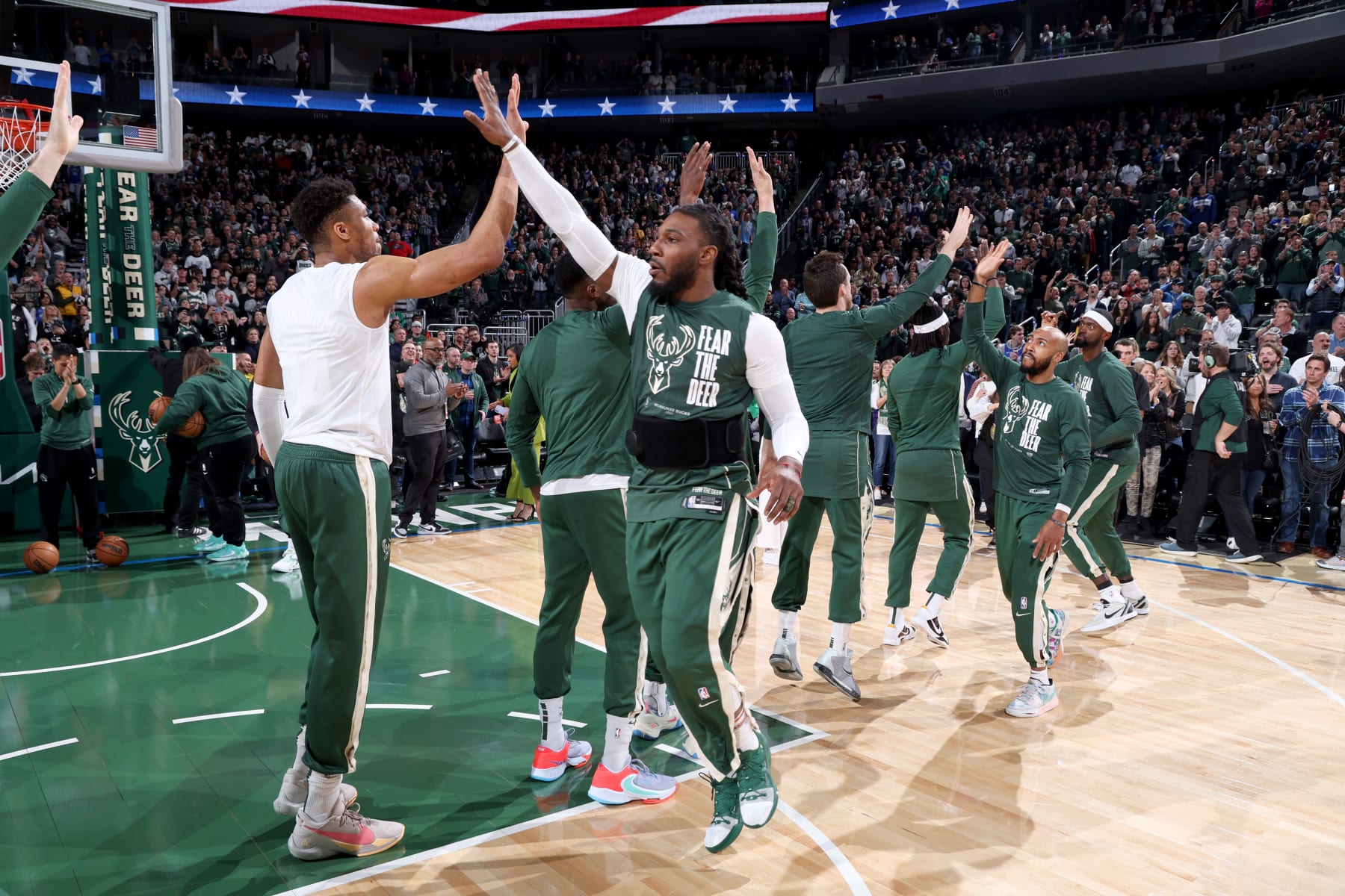 MILWAUKEE, WI - APRIL 26: Jae Crowder #99 of the Milwaukee Bucks high fives Giannis Antetokounmpo #34 before the game against the Miami Heat during Round 1 Game 5 of the 2023 NBA Playoffs on April 26, 2023 at the Fiserv Forum Center in Milwaukee, Wisconsin. NOTE TO USER: User expressly acknowledges and agrees that, by downloading and or using this Photograph, user is consenting to the terms and conditions of the Getty Images License Agreement. Mandatory Copyright Notice: Copyright 2023 NBAE (Photo by Jeff Haynes/NBAE via Getty Images).