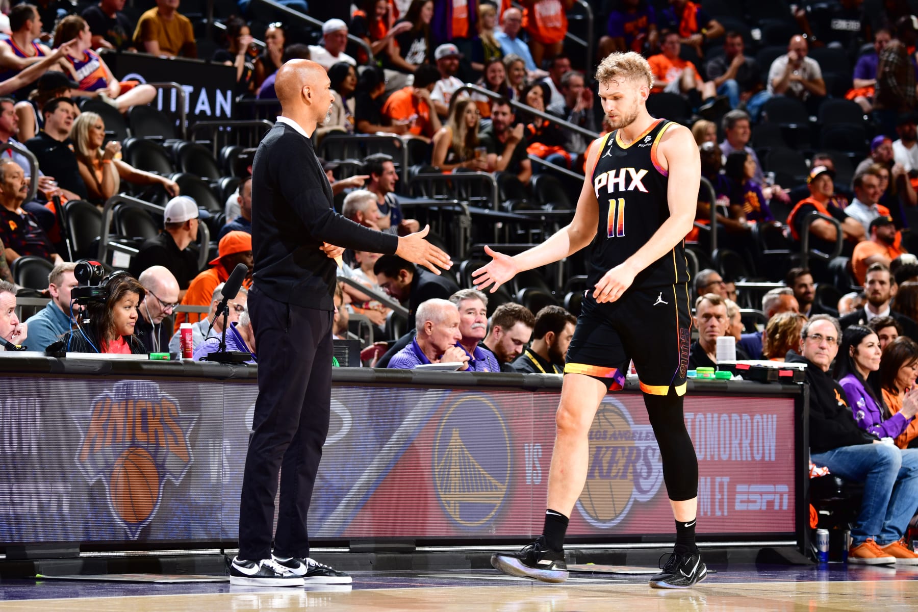 PHOENIX, AZ - MAY 11: Head Coach Monty Williams of the Phoenix Suns high fives Jock Landale #11 during Game 6 of the 2023 NBA Playoffs Western Conference semi-finals on May 11, 2023 at Footprint Center in Phoenix, Arizona. NOTE TO USER: User expressly acknowledges and agrees that, by downloading and or using this photograph, user is consenting to the terms and conditions of the Getty Images License Agreement. Mandatory Copyright Notice: Copyright 2023 NBAE (Photo by Barry Gossage/NBAE via Getty Images)