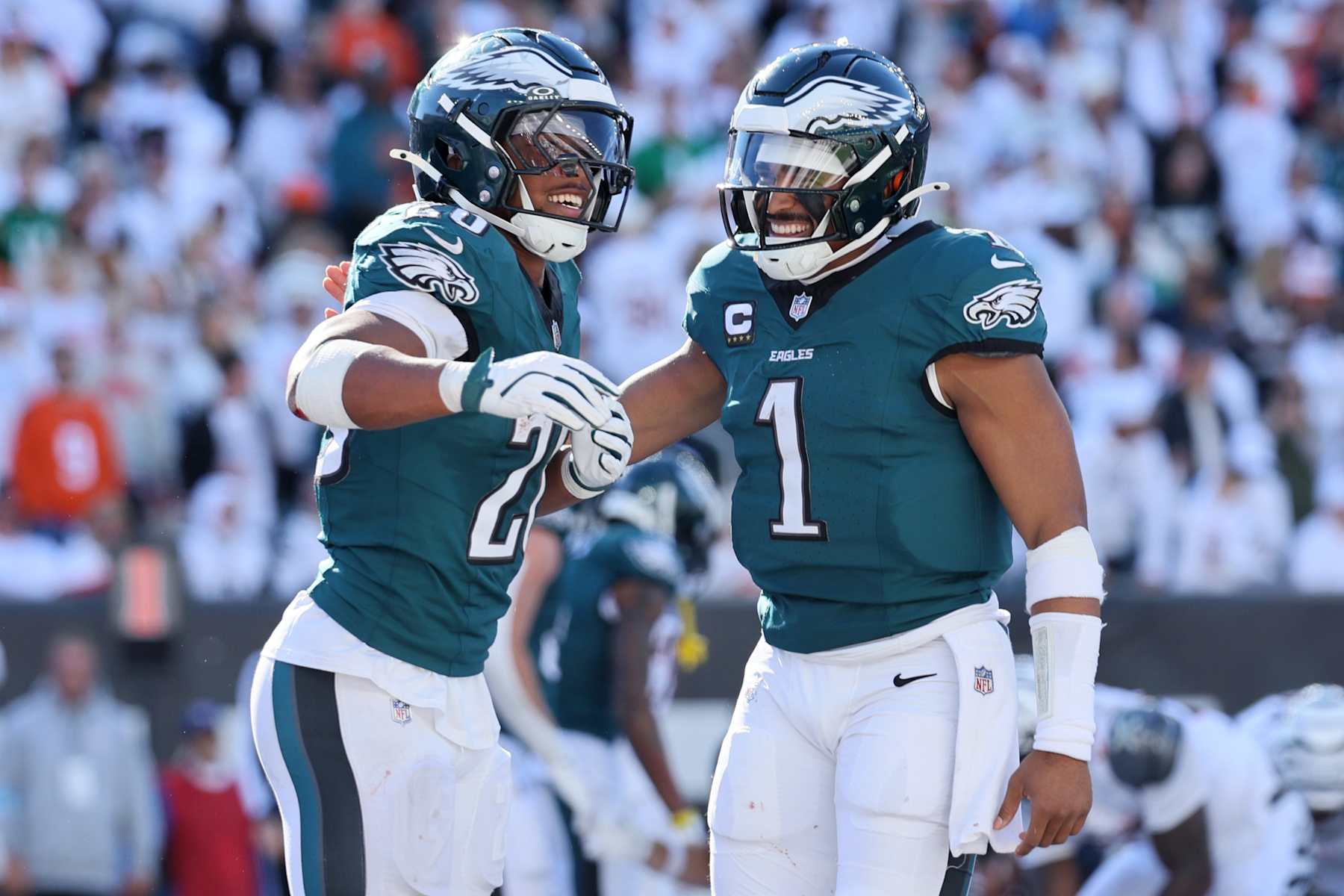 CINCINNATI, OHIO - OCTOBER 27: Saquon Barkley #26 and Jalen Hurts #1 of the Philadelphia Eagles celebrate a touchdown during the fourth quarter against the Cincinnati Bengals at Paycor Stadium on October 27, 2024 in Cincinnati, Ohio. (Photo by Andy Lyons/Getty Images)