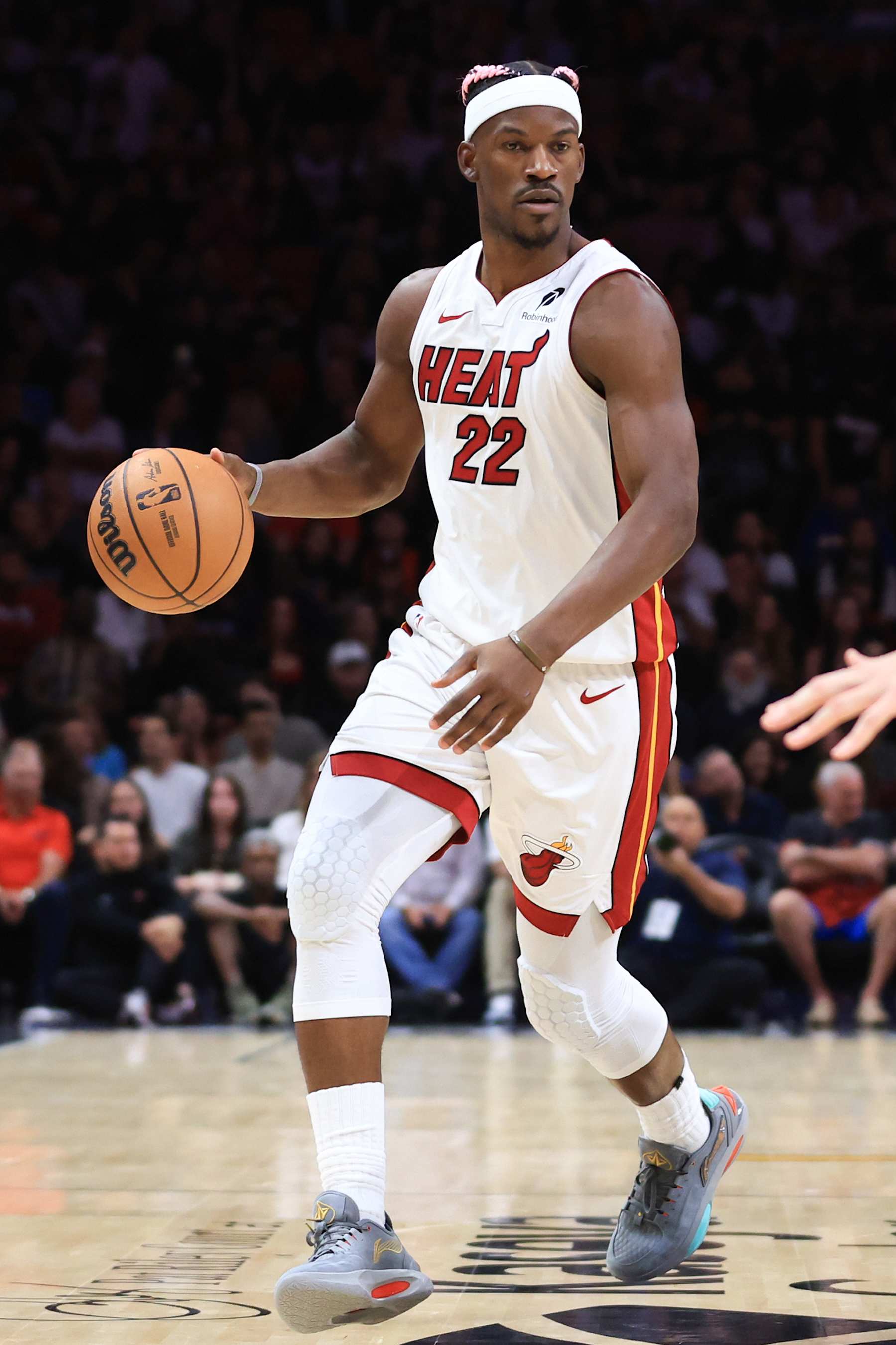 MIAMI, FLORIDA - JANUARY 01: Jimmy Butler #22 of the Miami Heat dribbles the ball against the New Orleans Pelicans during the second quarter at Kaseya Center on January 01, 2025 in Miami, Florida. NOTE TO USER: User expressly acknowledges and agrees that, by downloading and or using this photograph, User is consenting to the terms and conditions of the Getty Images License Agreement. (Photo by Megan Briggs/Getty Images)