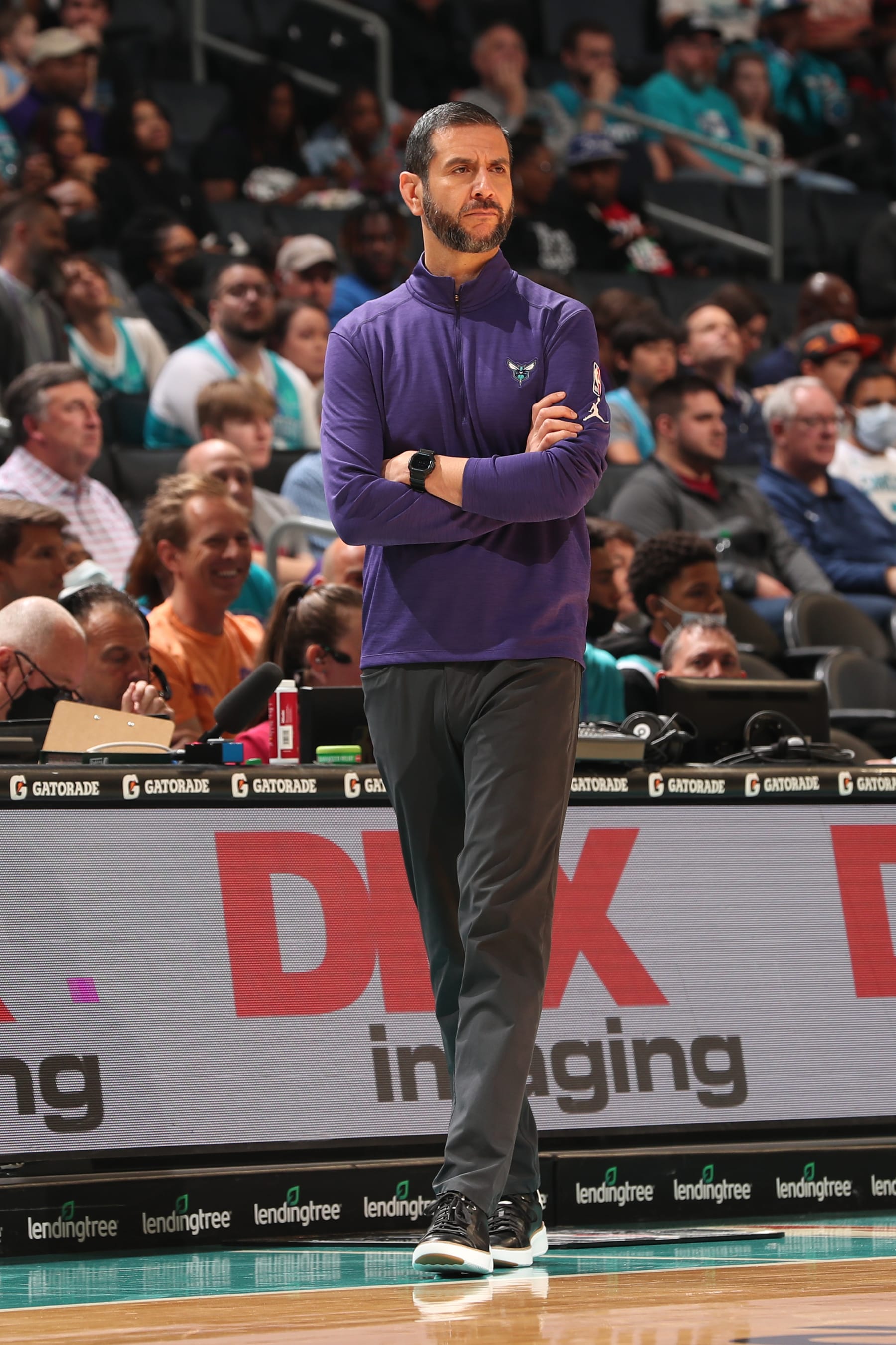CHARLOTTE, NC - APRIL 7: Head Coach James Borrego of the Charlotte Hornets looks on during the game against the Orlando Magic on April 7, 2022 at Spectrum Center in Charlotte, North Carolina. NOTE TO USER: User expressly acknowledges and agrees that, by downloading and or using this photograph, User is consenting to the terms and conditions of the Getty Images License Agreement.  Mandatory Copyright Notice:  Copyright 2022 NBAE (Photo by Brock Williams-Smith/NBAE via Getty Images)