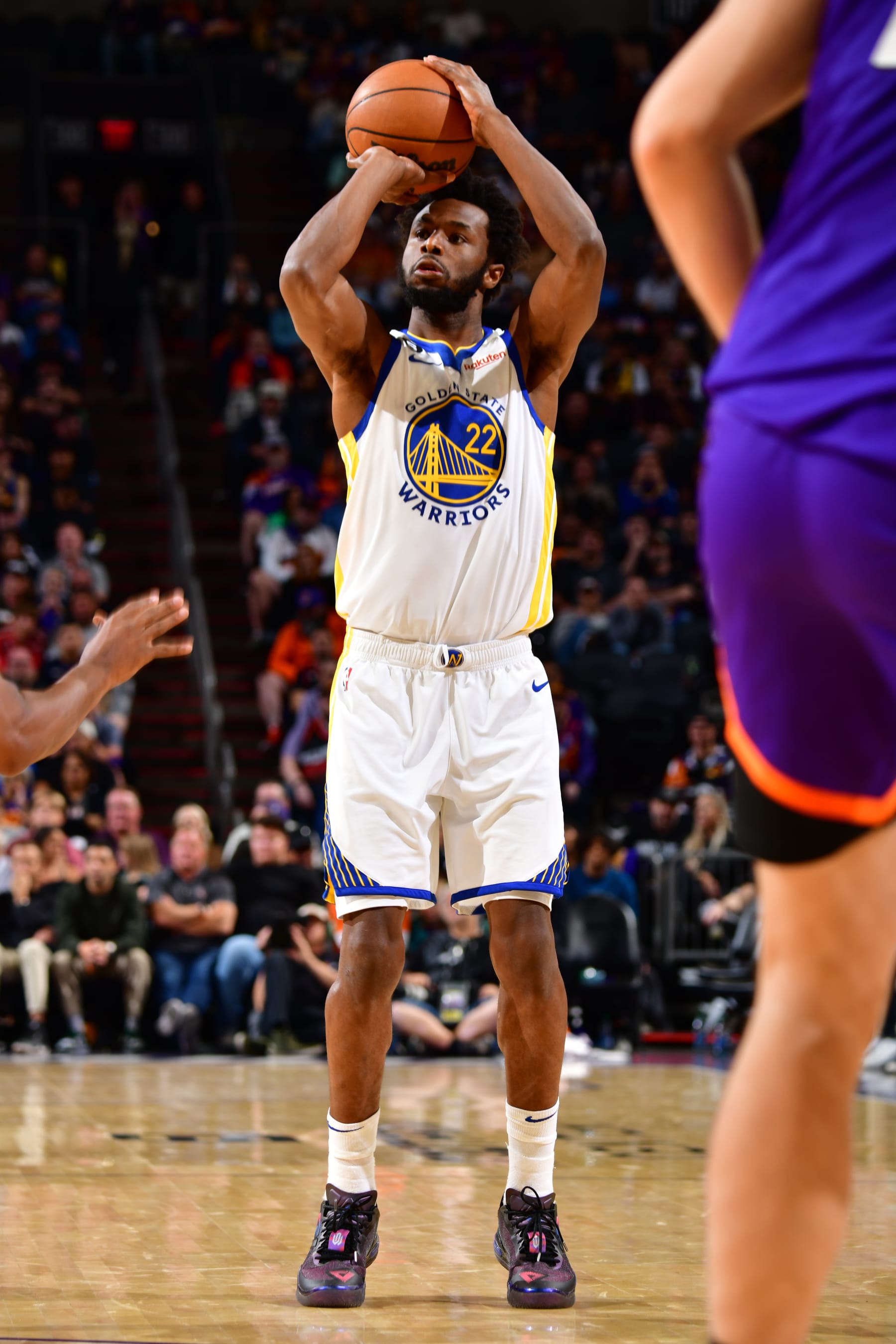 PHOENIX, AZ - OCTOBER 25: Andrew Wiggins #22 of the Golden State Warriors shoots the ball during the game against the Phoenix Suns on October 25, 2022 at Footprint Center in Phoenix, Arizona. NOTE TO USER: User expressly acknowledges and agrees that, by downloading and or using this photograph, user is consenting to the terms and conditions of the Getty Images License Agreement. Mandatory Copyright Notice: Copyright 2022 NBAE (Photo by Barry Gossage/NBAE via Getty Images)