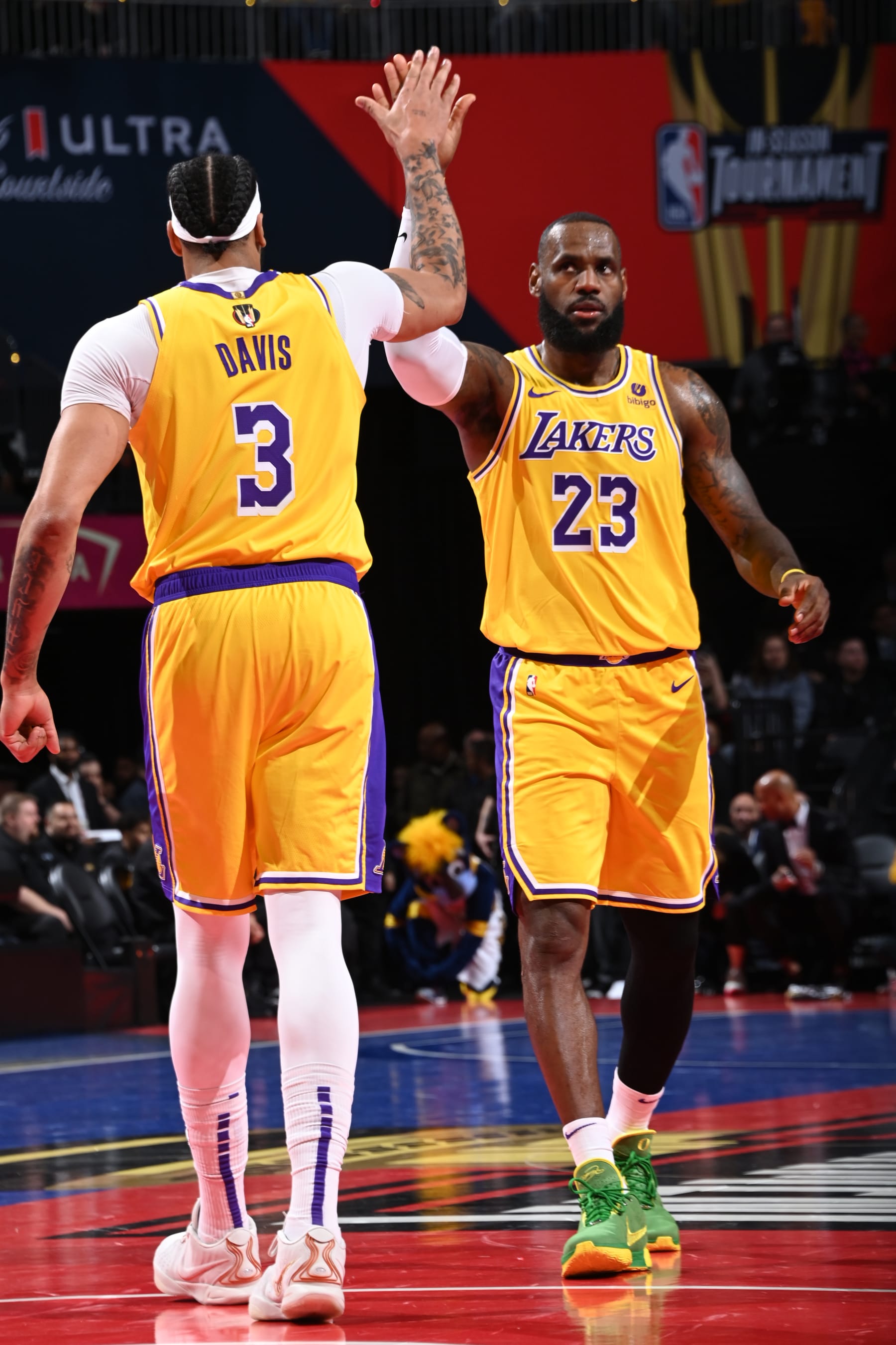 LAS VEGAS, NV - DECEMBER 9: LeBron James #23  and Anthony Davis #3 of the Los Angeles Lakers high five during the game against the Indiana Pacers during the In-Season Tournament Championship game on December 9, 2023 at T-Mobile Arena in Las Vegas, Nevada. NOTE TO USER: User expressly acknowledges and agrees that, by downloading and or using this photograph, User is consenting to the terms and conditions of the Getty Images License Agreement. Mandatory Copyright Notice: Copyright 2023 NBAE (Photo by Andrew D. Bernstein/NBAE via Getty Images)