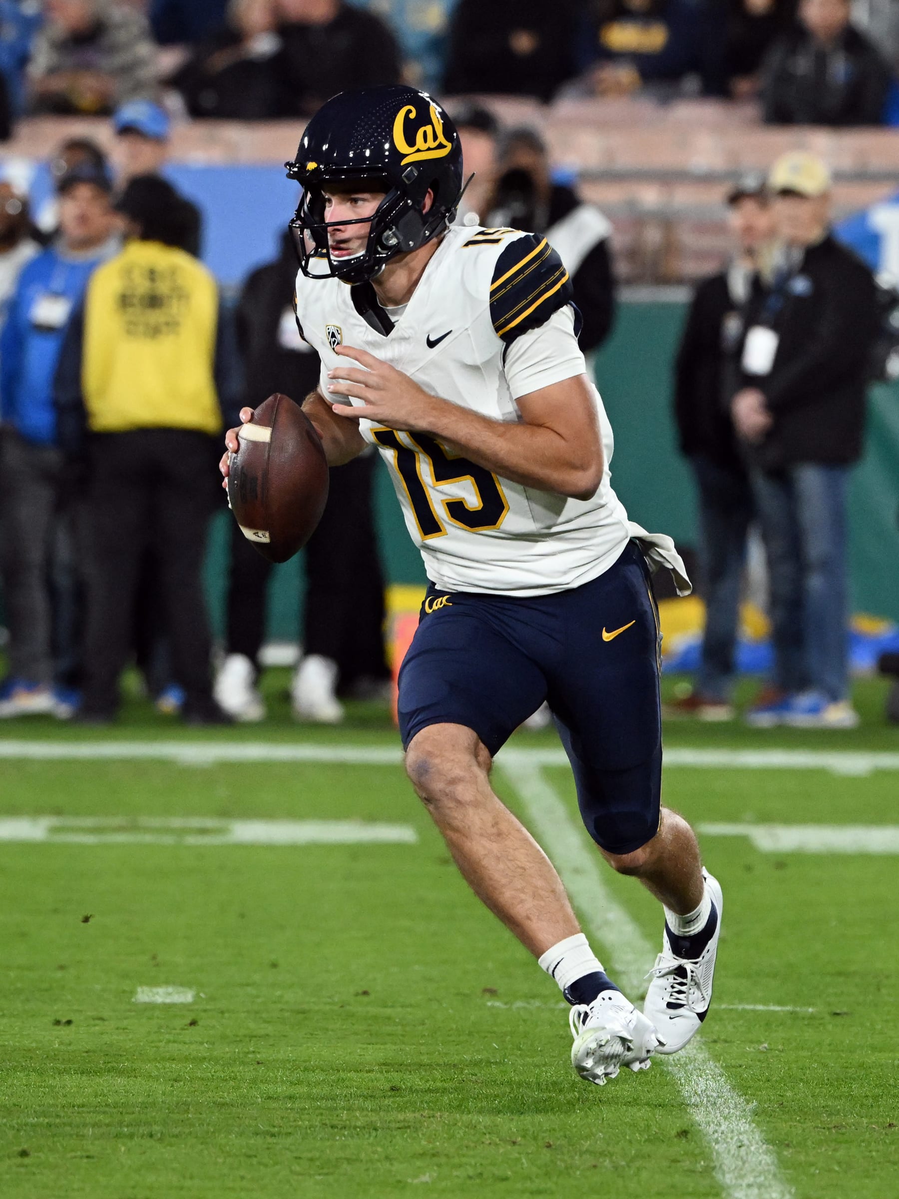 PASADENA, CA - NOVEMBER 25: California Golden Bears quarterback Fernando Mendoza (15) scrambles with the ball during an NCAA football game against the UCLA Bruins played on November 25, 2023 at the Rose Bowl in Pasadena, CA. (Photo by John Cordes/Icon Sportswire via Getty Images)
