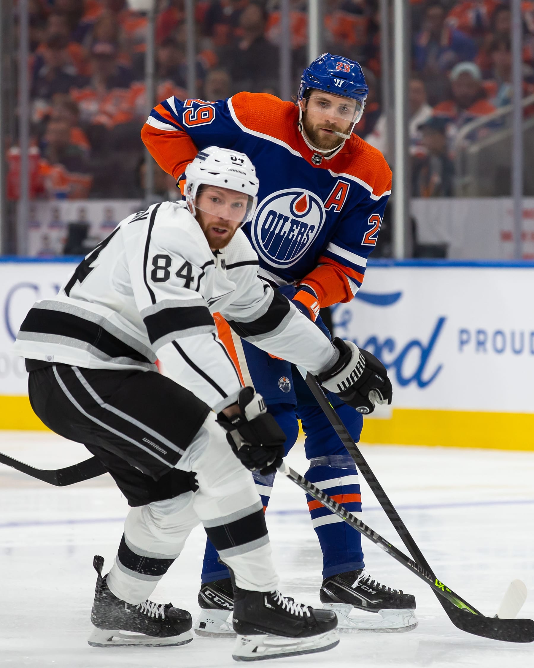 EDMONTON, AB - APRIL 25: Leon Draisaitl #29 of the Edmonton Oilers battles against Vladislav Gavrikov #84 of the Los Angeles Kings during the second period in Game Five of the First Round of the 2023 Stanley Cup Playoffs at Rogers Place on April 25, 2023, in Edmonton, Canada. (Photo by Codie McLachlan/Getty Images)