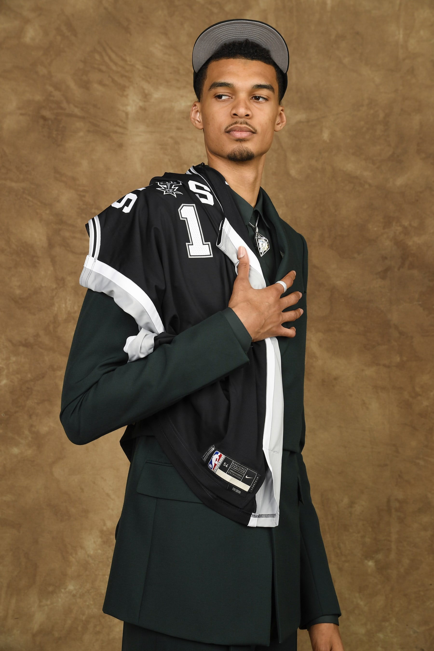 BROOKLYN, NY - JUNE 22: Victor Wembanyama poses for a portrait after being drafted number one overall by the San Antonio Spurs during the 2023 NBA Draft on June 22, 2023 at Barclays Center in Brooklyn, New York. NOTE TO USER: User expressly acknowledges and agrees that, by downloading and or using this photograph, User is consenting to the terms and conditions of the Getty Images License Agreement. Mandatory Copyright Notice: Copyright 2023 NBAE (Photo by Brian Babineau/NBAE via Getty Images)